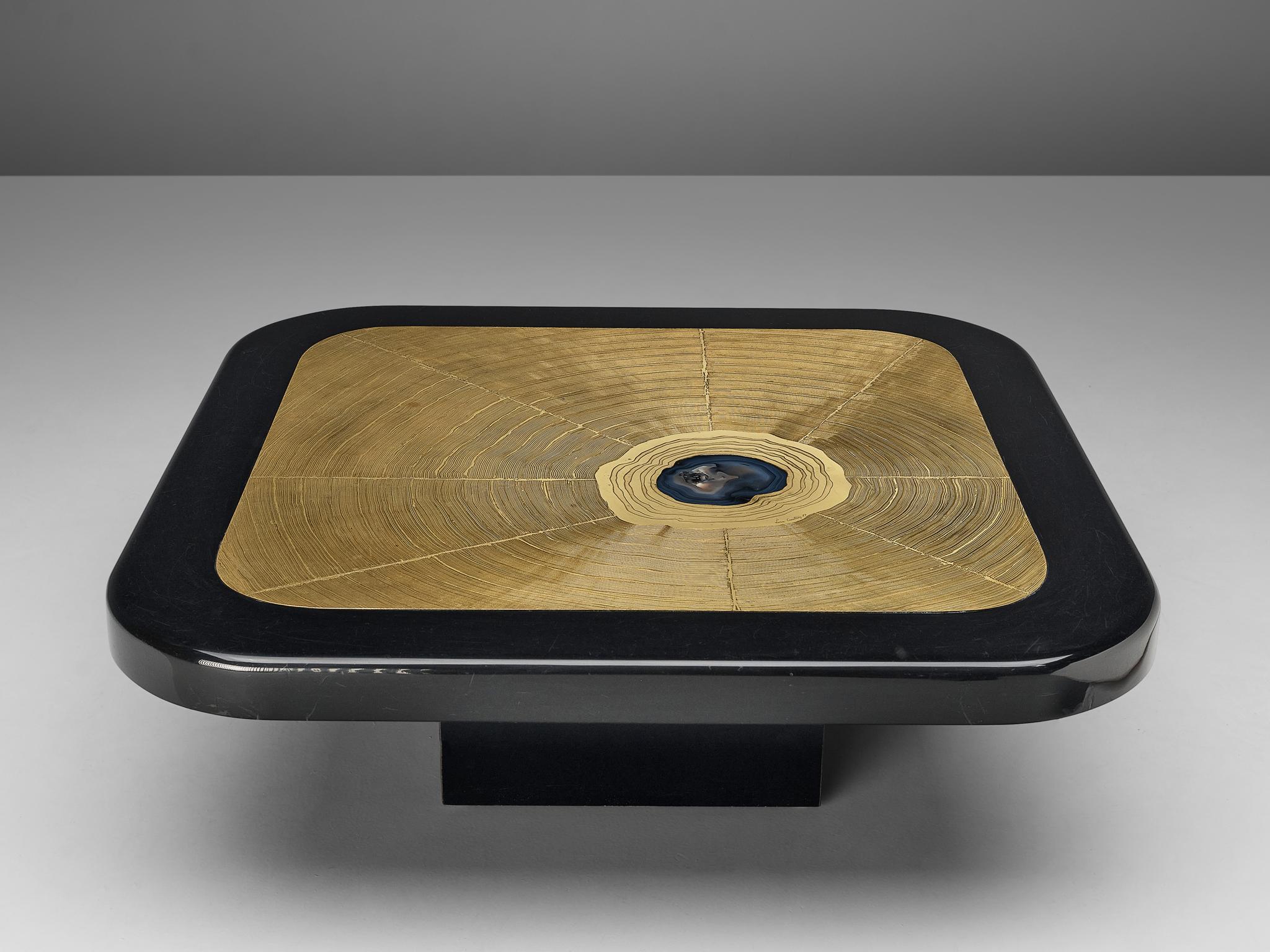Lova Creation coffee table, brass, metal, wood, agate, Belgium, 1987

This luxurious side table by Lova Creation is a dazzling eyecatcher. The golden square tabletop is signed and shows a pattern of large abstract brush strokes. The center is