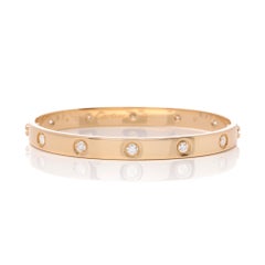Love 10 Diamond 18 Carat Yellow Gold Bangle