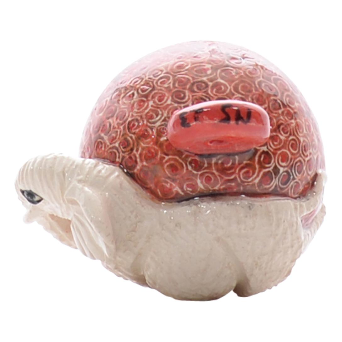 The ceramic Elephant ornament by Love Art Ceramic is a testament to African culture. Hand-painted by Nozipho Ntshalintshali and hand-sculpted by Sondelani Ntshalintshali, this 4-inch high, 2-inch long, and 2-inch wide piece features relief-sculpted