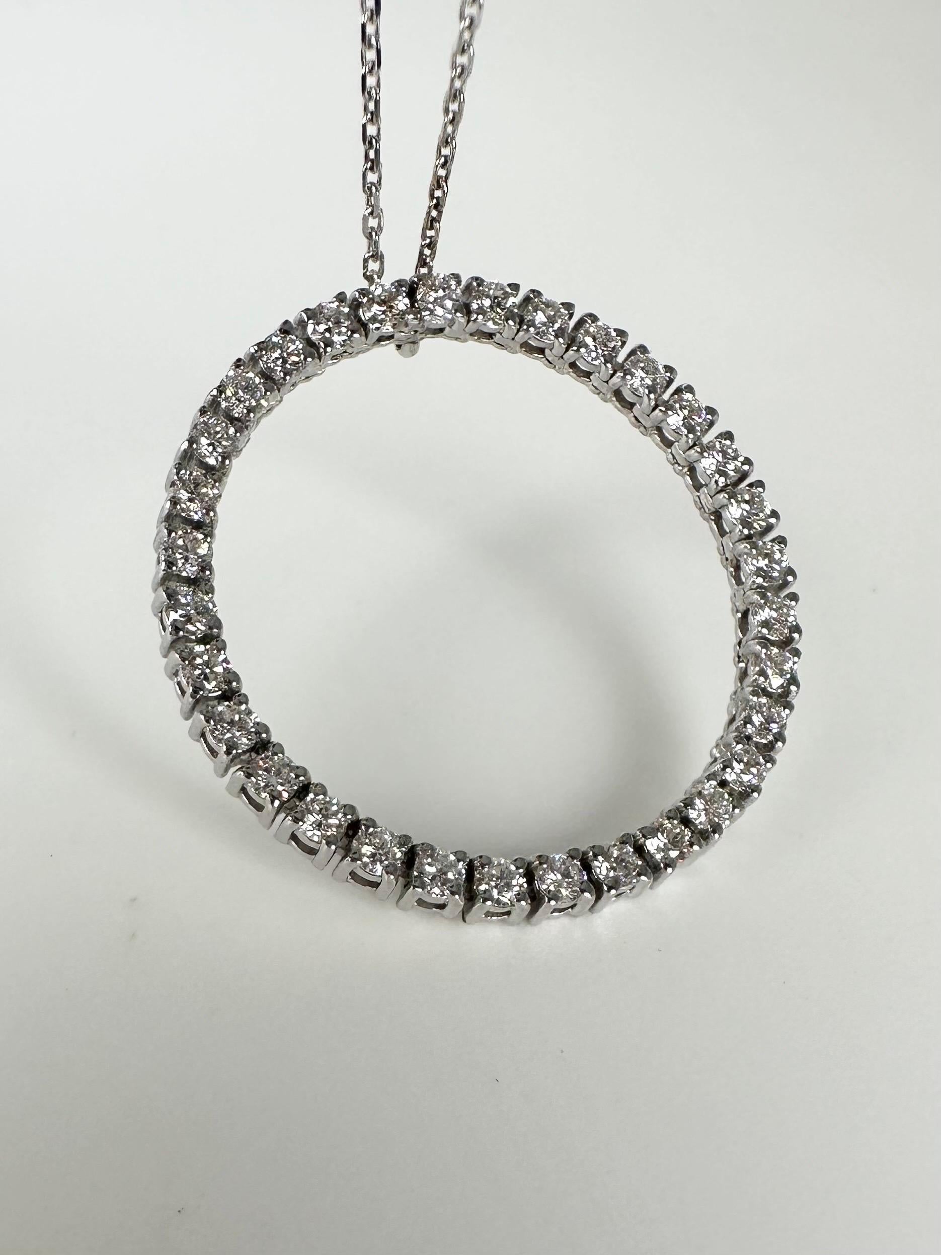 Unique flexible circle pendant made with natural diamonds in 14KT white gold, a circle of love and infinity!

GOLD: 14KT gold
18 inches long
NATURAL DIAMOND(S)
Clarity/Color: VS-SI/F-G
Carat:0.196ct
Cut:Round