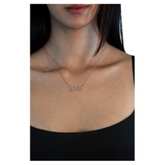 "LOVE" Diamond Pendant 0.47 cts.
