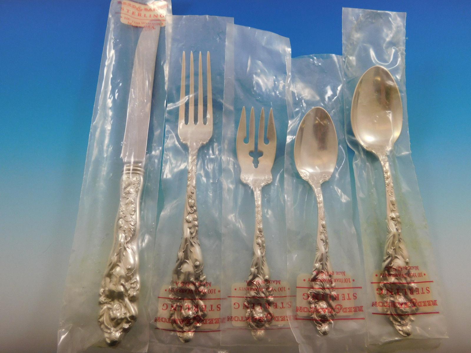 Exceptional dinner size love disarmed by Reed & Barton sterling silver flatware set of 48 pieces. This set includes:

Eight dinner size knives, 9 3/4