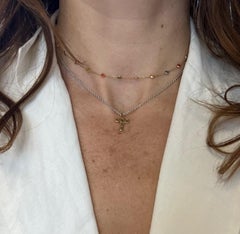 Croce LOVE GOD in oro giallo 18k