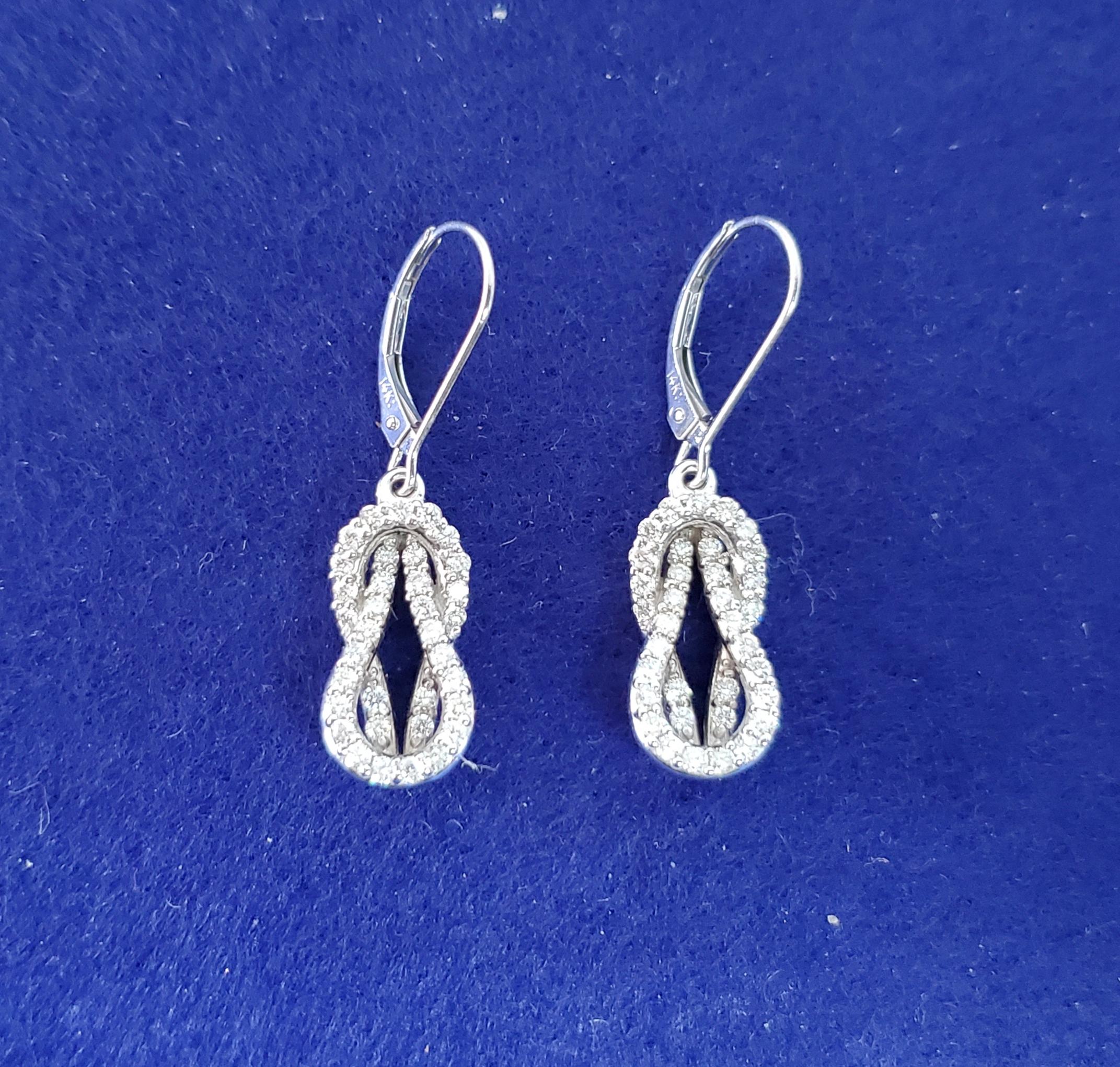 Love Knot Drop Dangling Diamond Earrings .75cttw 14K White Gold In New Condition For Sale In Sugar Land, TX