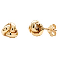 Fourteen Karats Yellow Gold 0.40 Inch Wide Love Knot Stud Earrings 