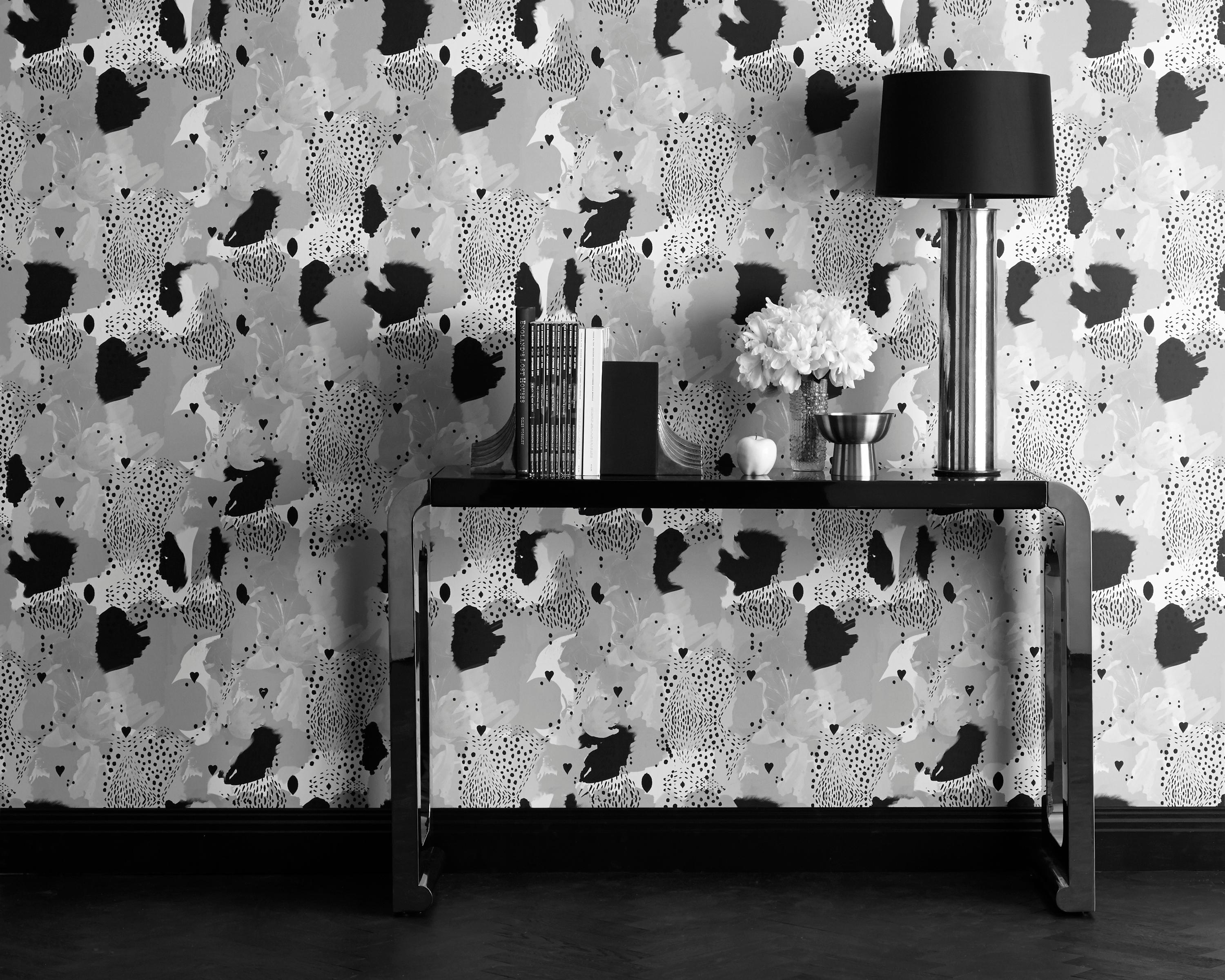 Using traditional and digital mark-making techniques, this alluring composition of love hearts, spot formations and peppered textured camouflage, delivers a beautiful exploration into the wild. With its contrasting, delicate soft tones and darker