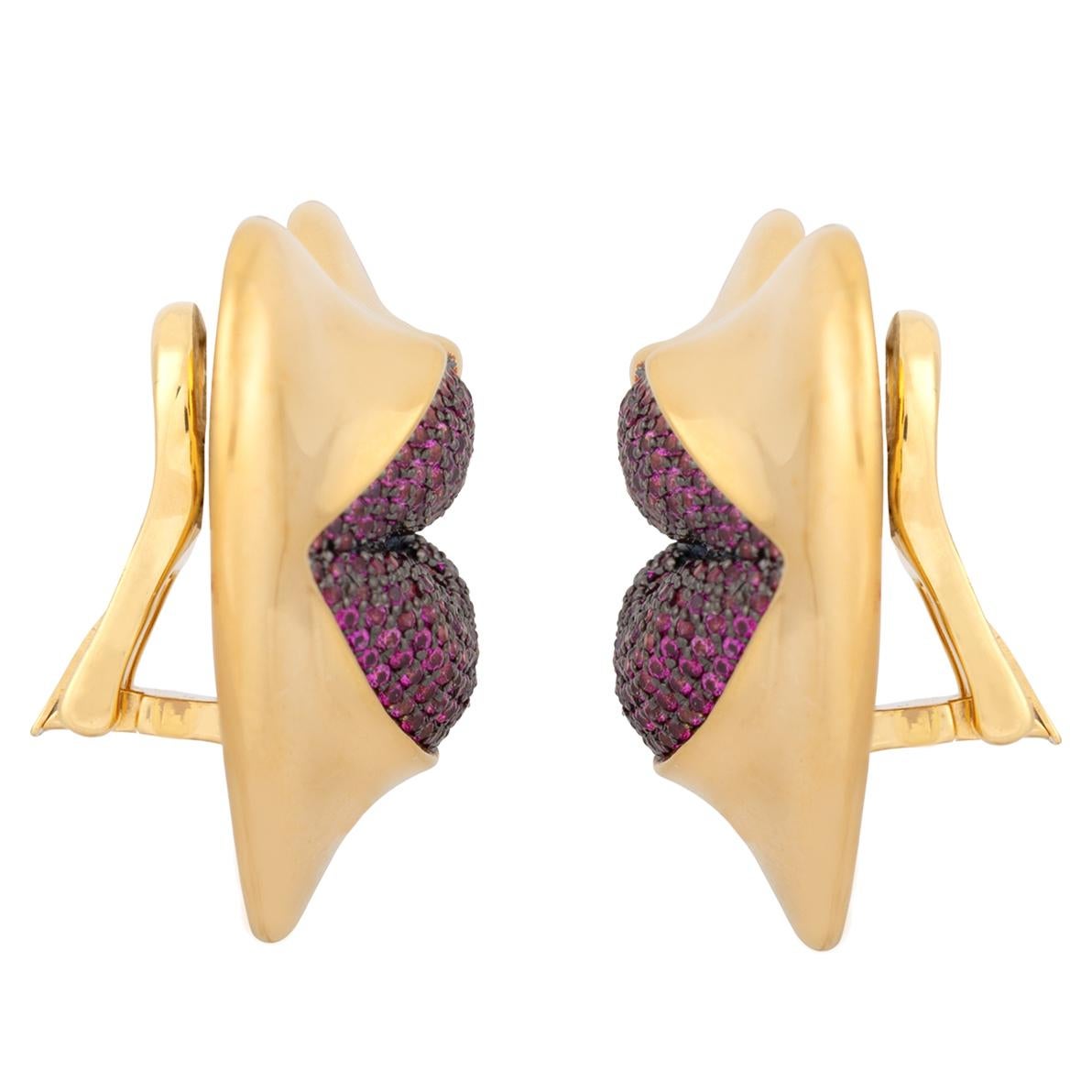 Love Lips Statement clip on earrings with all hand set red crystals, sparkle like ruby. Show your color of love!

PRODUCT DETAILS:
Composition: 925 Sterling Silver, 18k gold (thick 1 micron coat of 18k yellow gold on a solid sterling silver base)