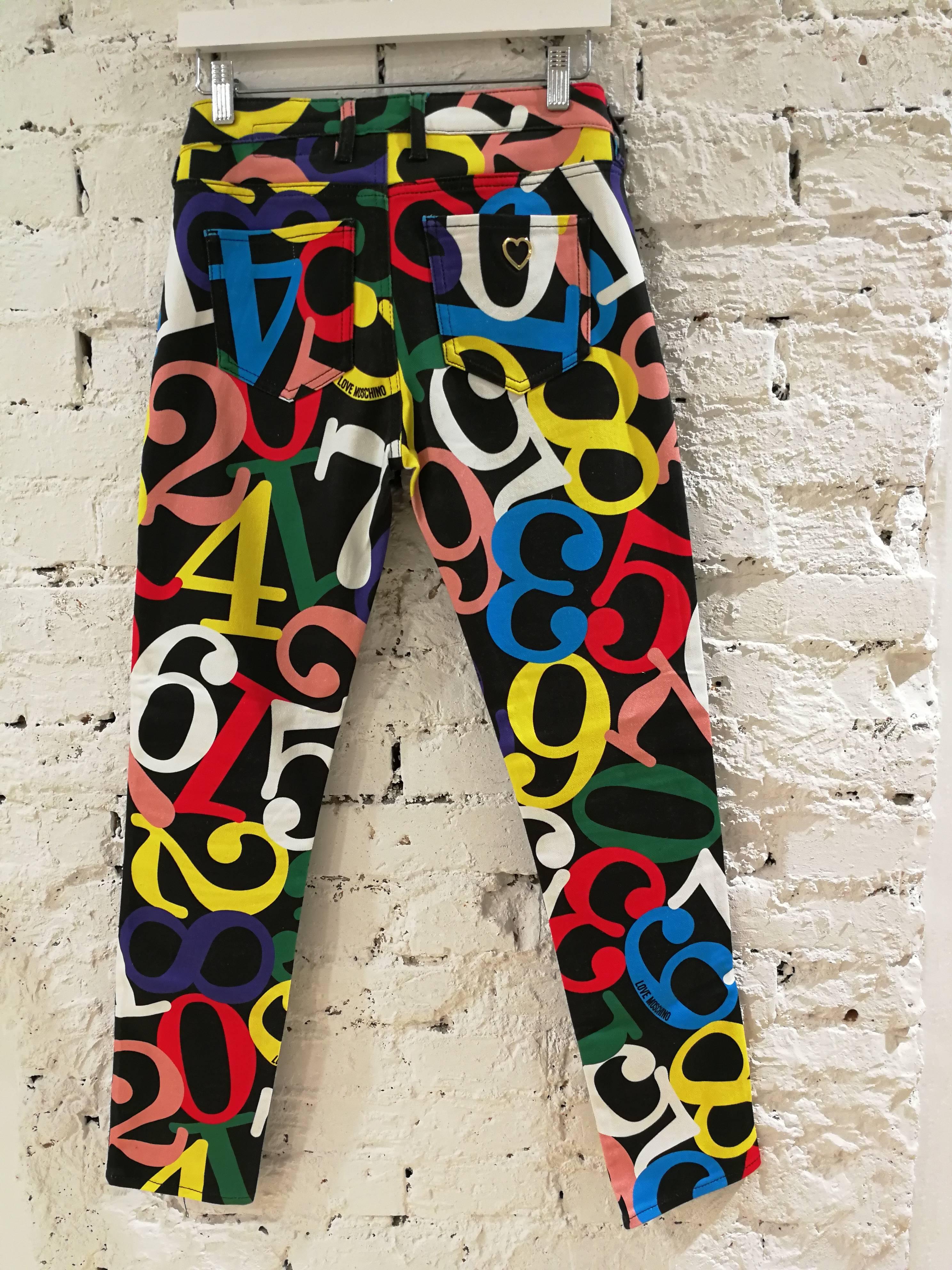Love Moschino Black multicolour Trousers

multicoloured numbers all over 

totally made in italy in size 42
composition : Cotton

total lenght: 96 cm
waist: 76 cm
