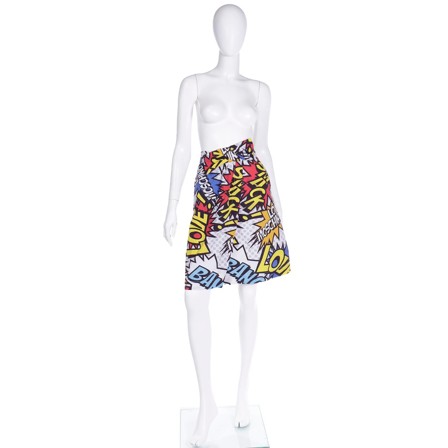 This fun Love Moschino cartoon pop art wrap skirt is from the Spring 2014 collection and it features really fun, comic book style words! .  This bold, colorful skirt features the words: Smack, Love, Bang, Oh, Love Moschino, etc..,inside of 
