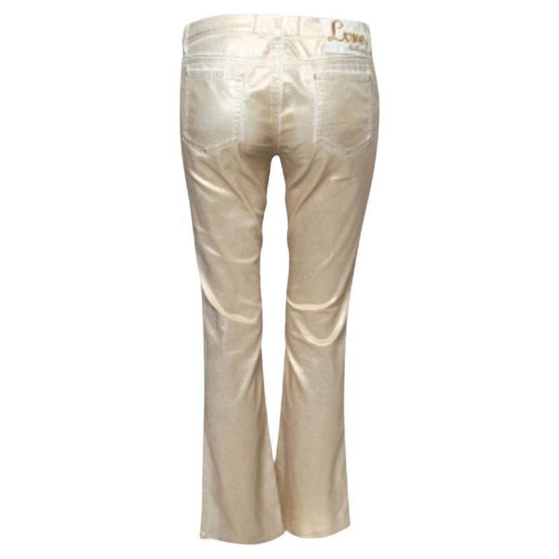 Love Moschino's straight-fit jeans have a low-waist cut and a gold foil print design for a standout feel. The pair is super chic in look and comfortable in fit.