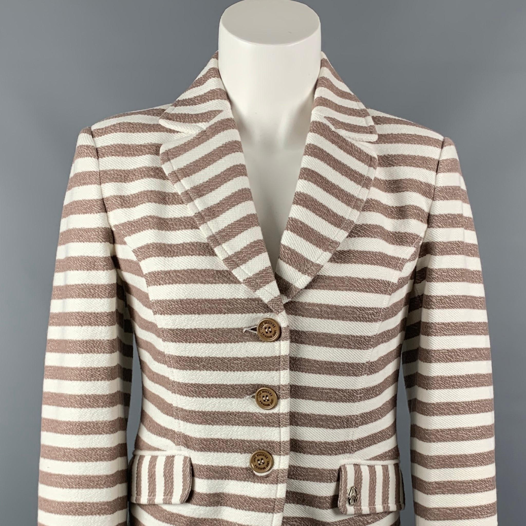 LOVE MOSCHINO jacket comes in a cream & taupe stripe cotton with a full liner featuring a notch lapel, flap pockets, silver tone logo, and a three button closure.

New With Tags.
Marked: D 36 / GB 8 / F 36 / USA 4 / I 40   

Measurements:

Shoulder: