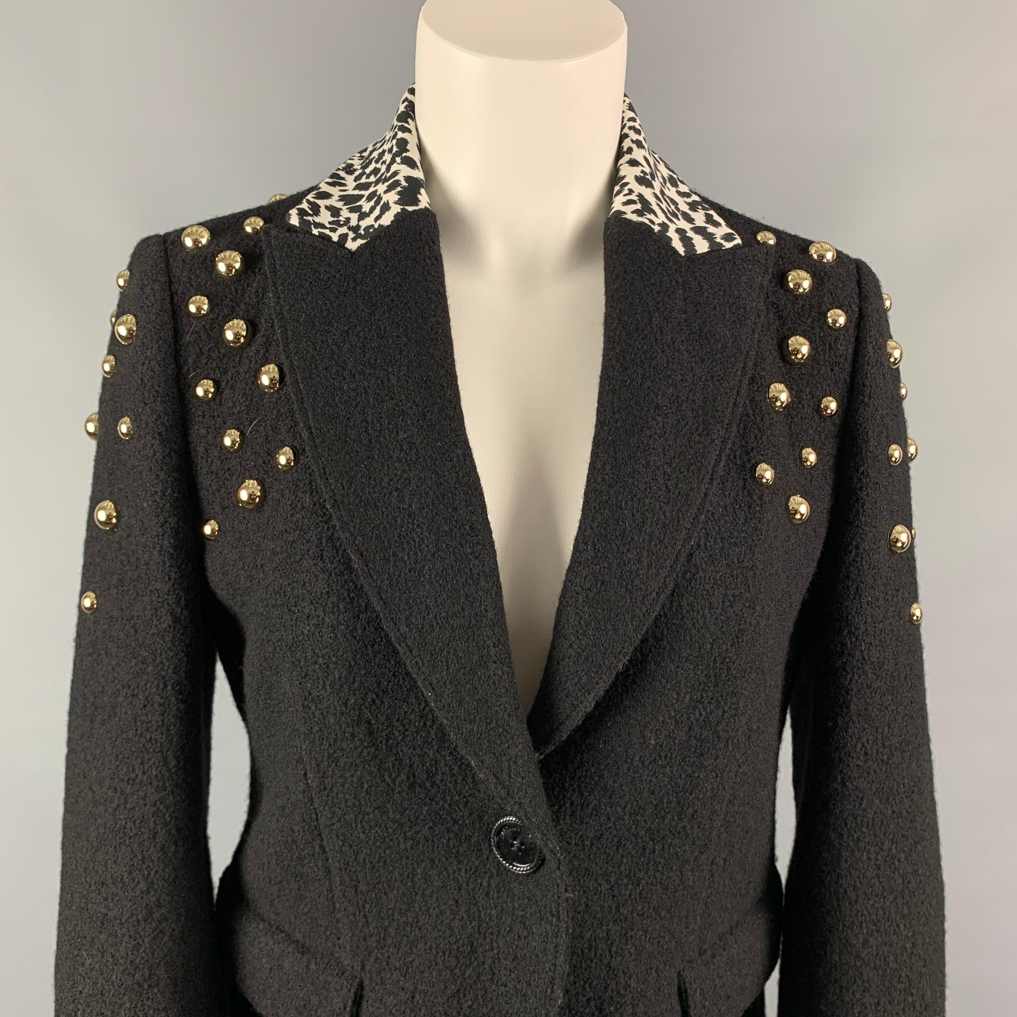 LOVE MOSCHINO jacket comes in a black wool with a white animal print peak lapel collar featuring a half liner, studded details, flap pockets, and a single button closure.

Very Good Pre-Owned Condition.
Marked: D 38 / GB 10 / F 38 / USA 6 / I