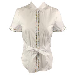 LOVE MOSCHINO Blusa blanca de algodón y elastano con cinturón abotonado y abalorios, talla 6