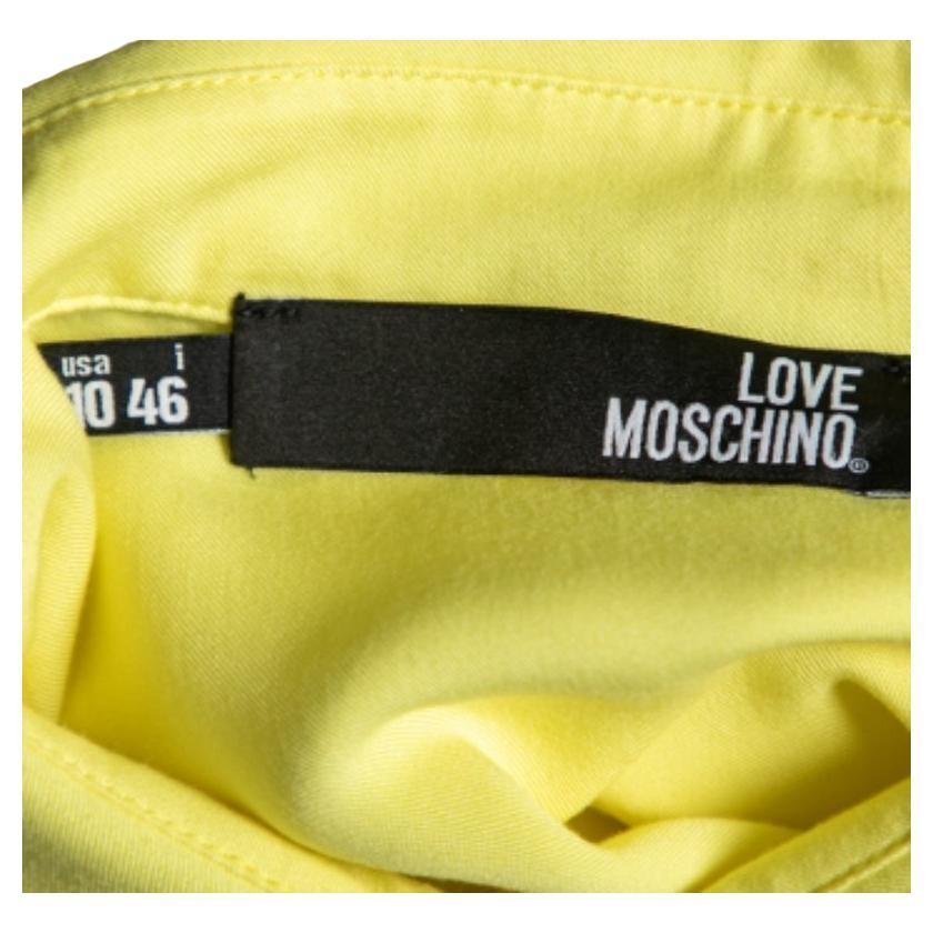 Love Moschino Camisa sin mangas estampada amarilla L en Excelente Estado en Dubai, Al Qouz 2