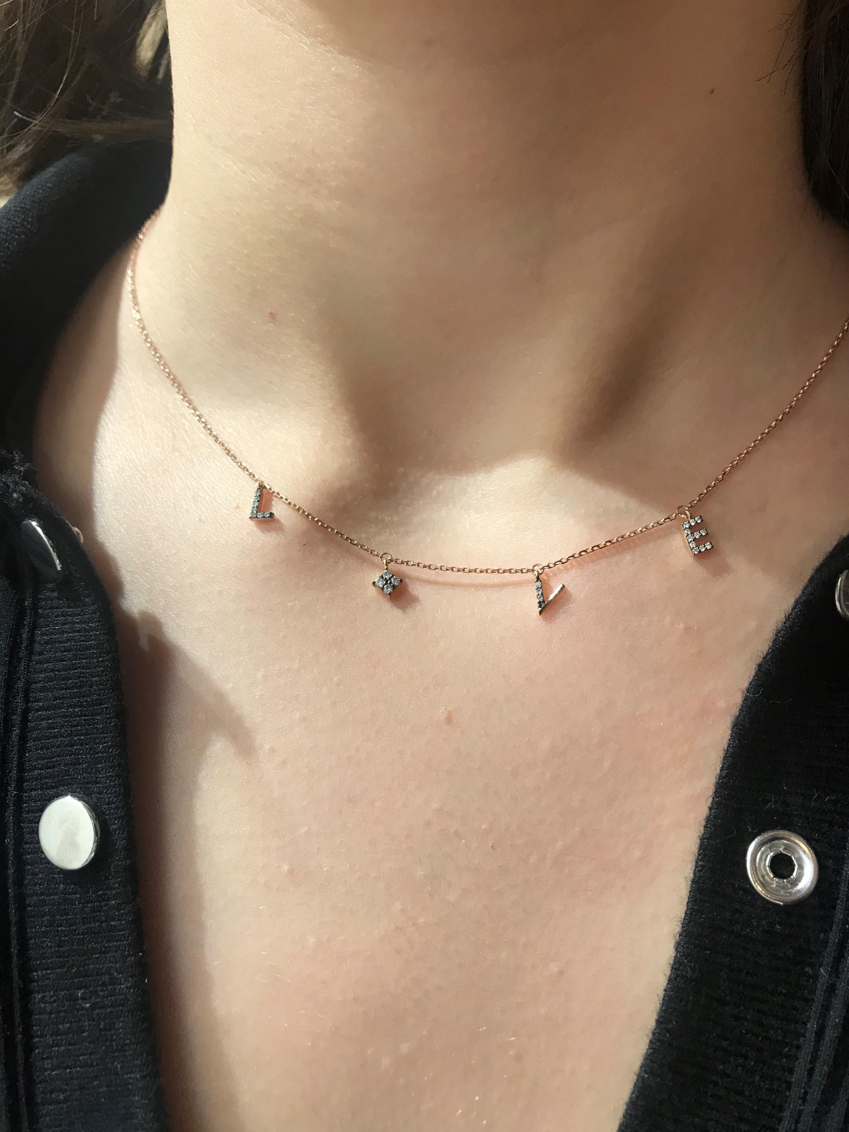 Love necklace with white diamond in 14k rose gold by Selda Jewellery

Additional Information:-
Collection: You Are My Star Collection
14k Rose gold
0.1ct White diamond
Chain length 42+4cm