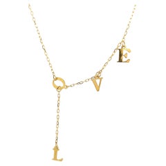 "LOVE" Pendant on Chain in 18ct Yellow Gold