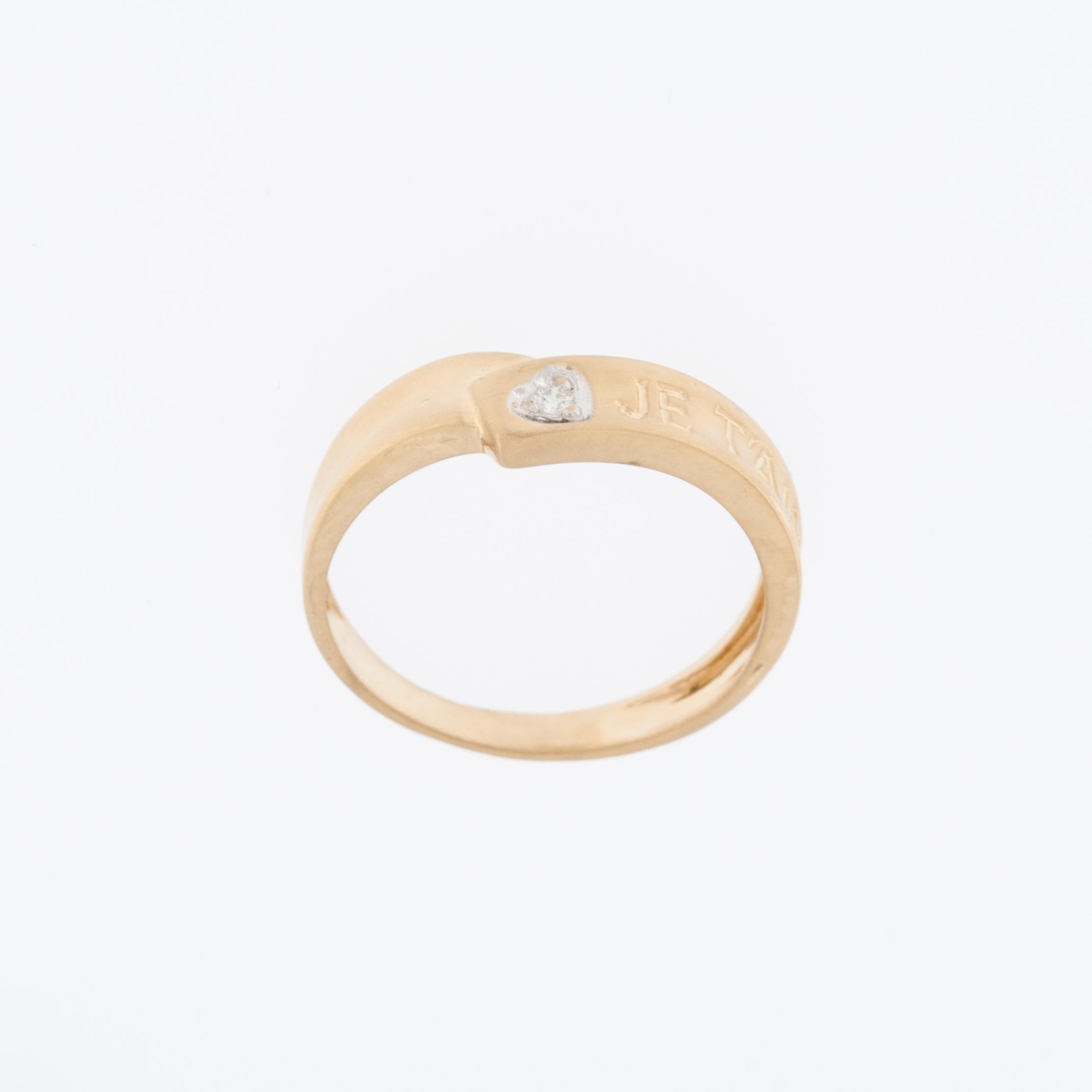 This exquisite Love Ring Band is a symbol of romance and sophistication, crafted with meticulous attention to detail. The band is made from high-quality 18 karat yellow gold, ensuring both durability and a warm, luxurious appearance.

At the center