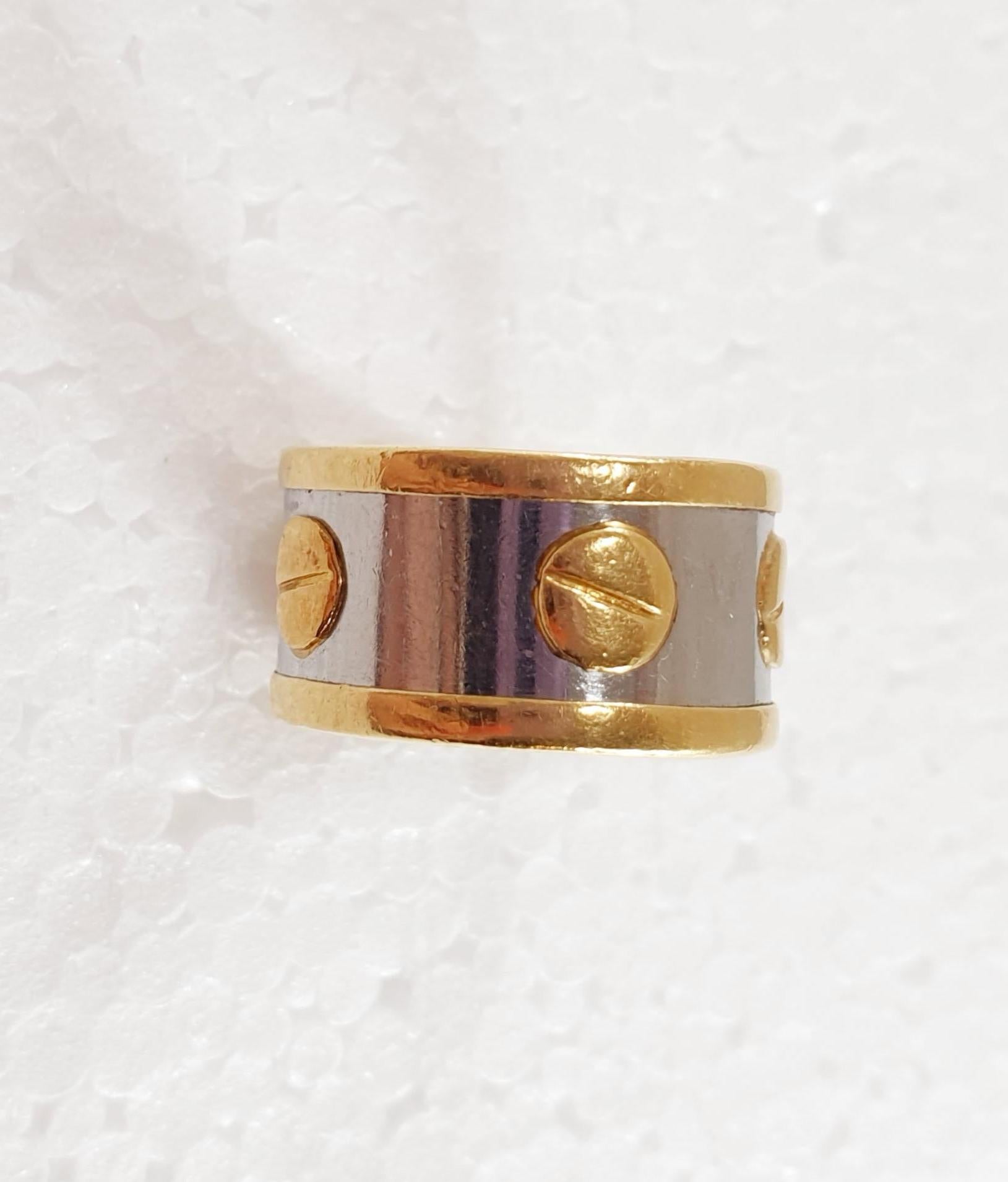Contemporary Love Ring in Stainless Steel and 18k Yellow Gold For Sale
