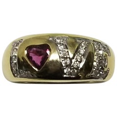 "Love" Ring with Ruby Heart and Diamond Set in 14k Yellow Gold
