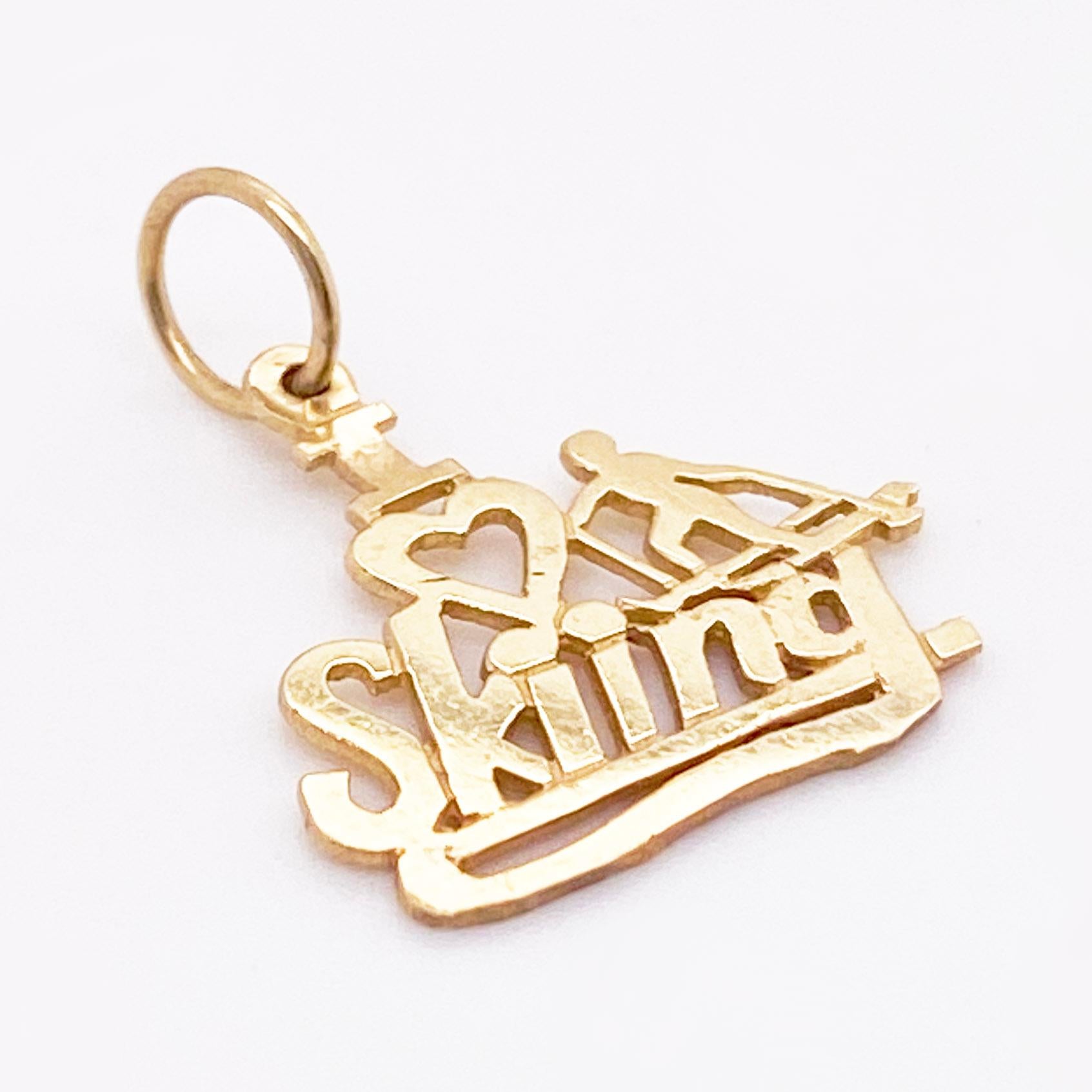 The dainty I Love Skiing Charm is perfect for any charm bracelet or as a pendant on a chain. It is stamped out to keep the price down.
Metal Quality: 14K Yellow Gold
Charm Style: Skiing Heart Charm
Charm Measurements: 17.2 x 17.7 millimeters
*chain