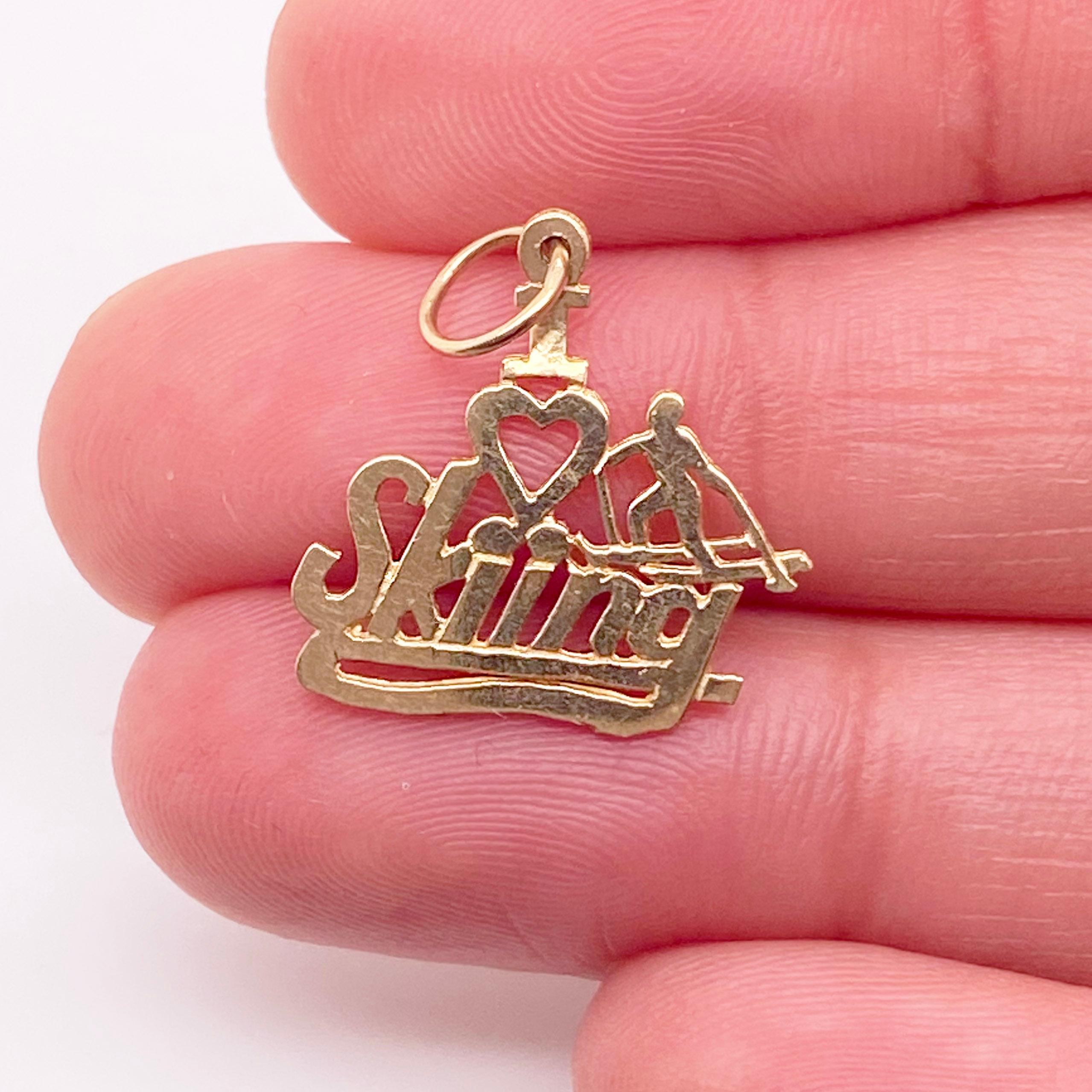 Love Skiing Charm or Pendant, 14K Yellow Gold, Stamped Out, I Love Skiing Charm In New Condition In Austin, TX
