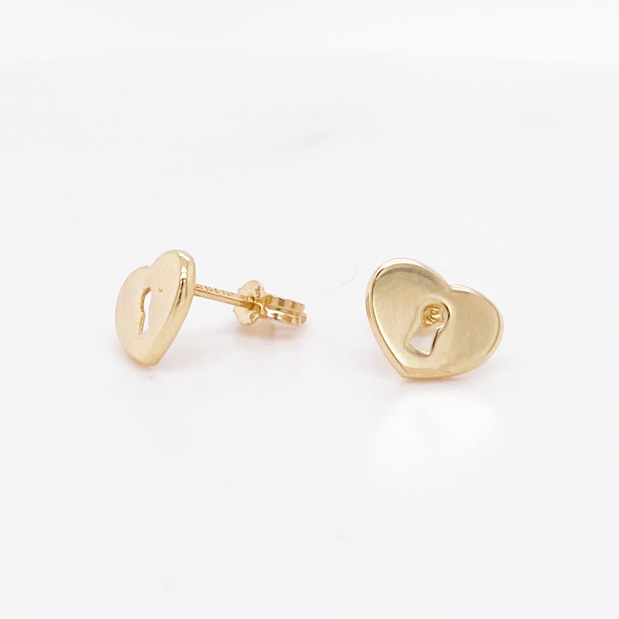 Cute and dainty love lock earrings! The perfect gift to show someone special how loved they are! These heart earrings are solid 14k yellow gold and have a keyhole cut out in the center. The earrings have comfortable push-on posts and backs that make