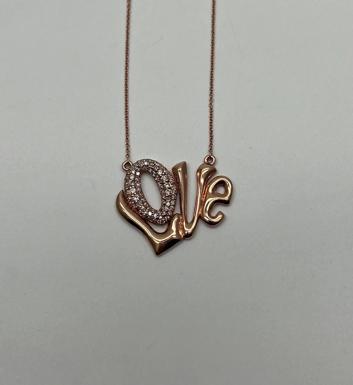 A captivating pendant necklace, featuring the word 