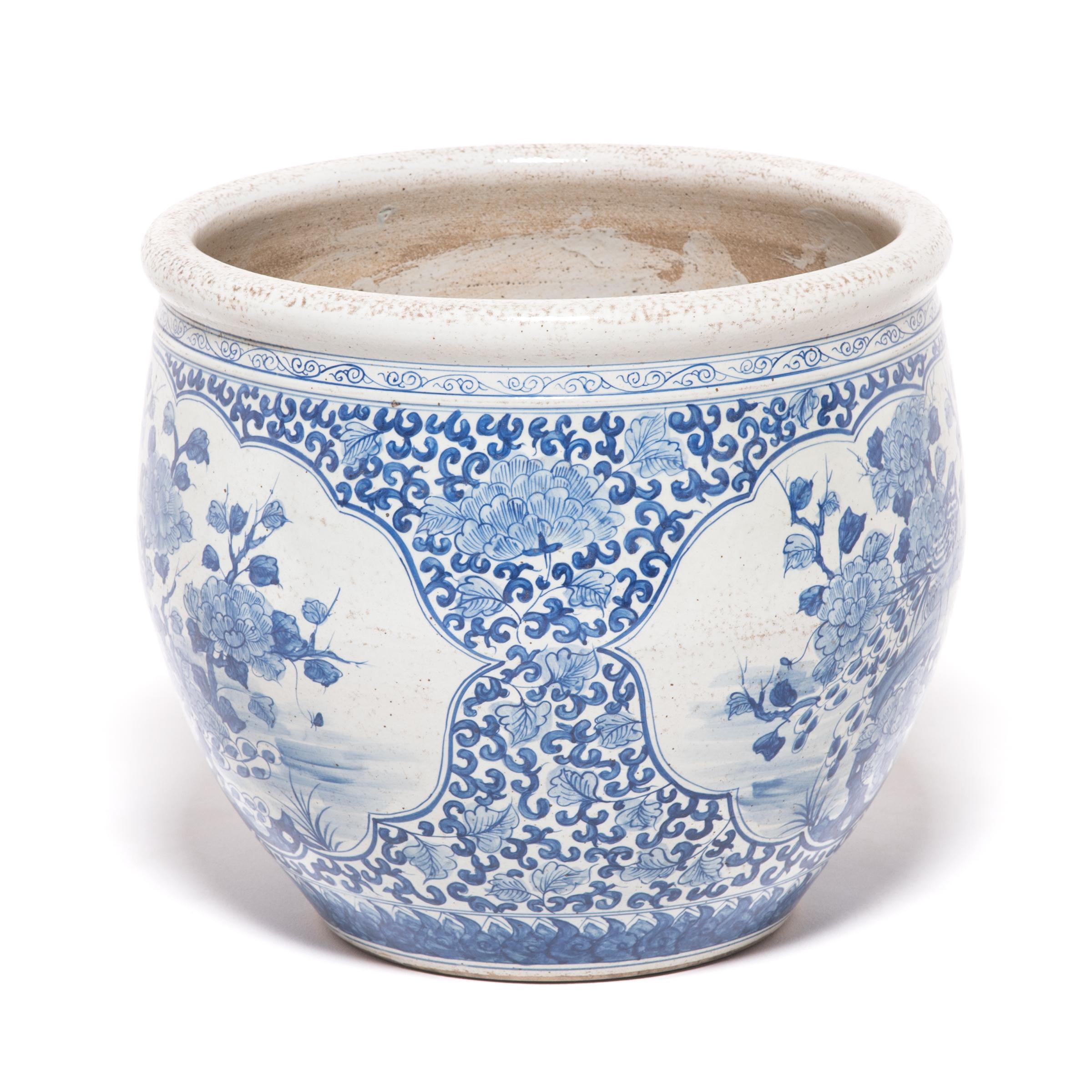 A suitable wedding gift, this blue-and-white bowl is hand painted with magpies, symbols of good fortune and talismans of marital happiness when depicted as a pair. Two cartouches on either side of the bowl present the gregarious birds in an