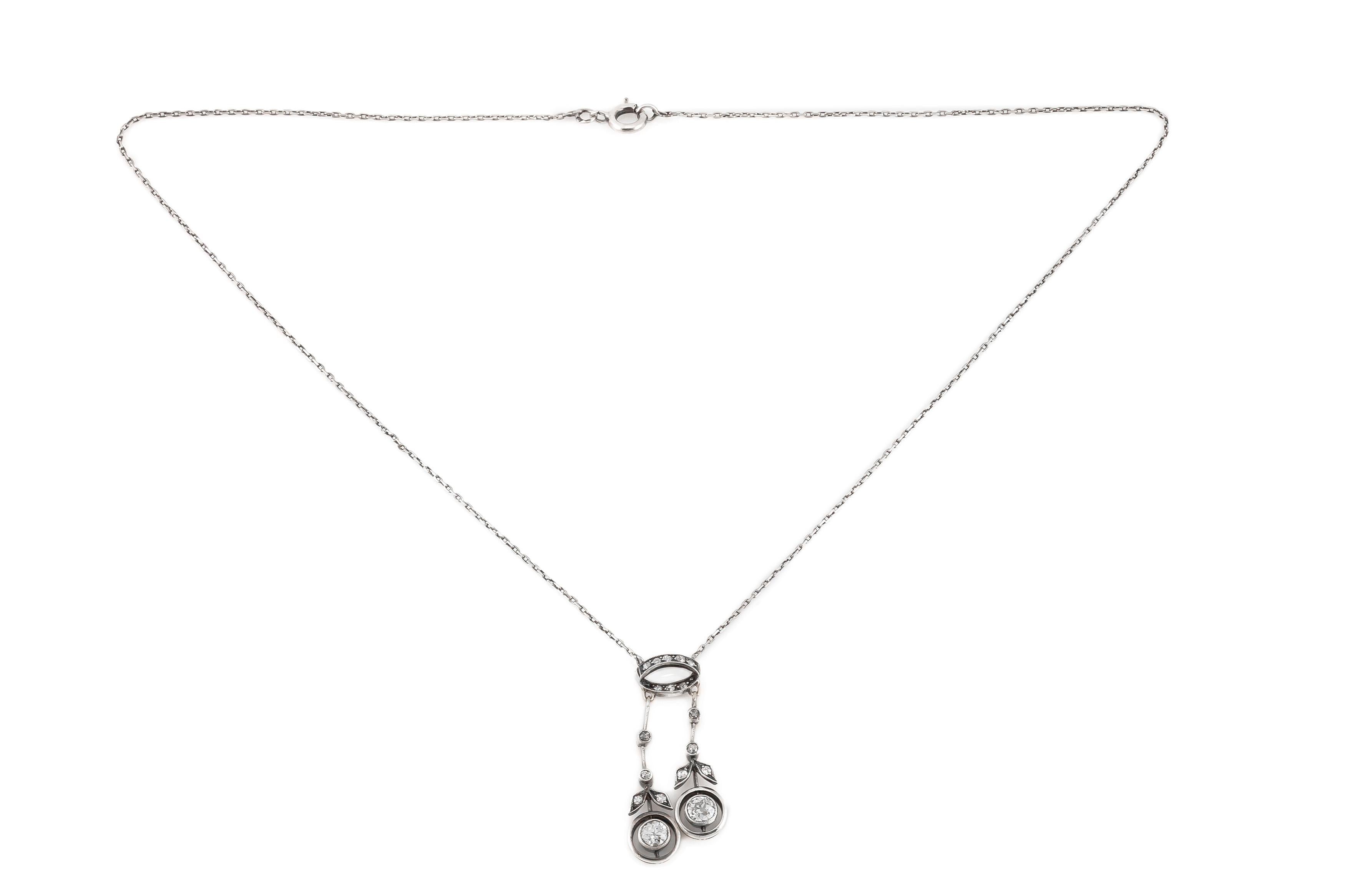 The necklace is finely crafted in platinum and 14k white gold with diamonds weighing approximately total of 1.10 carat.
