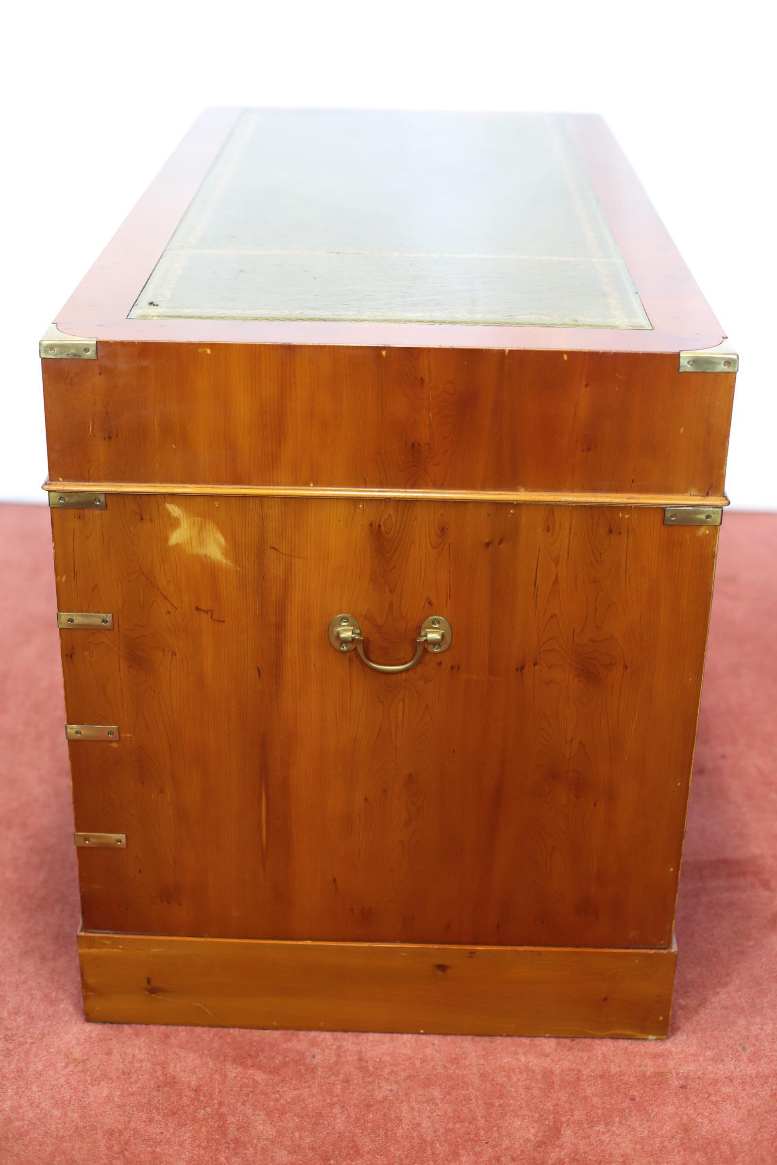 We delight to offer for sale this lovely yew campaign style pedestal desk with inset leather top and brass mounts and handles . Comes in three section for easy transportation, In good condition .
Don't hesitate to contact me if you have any
