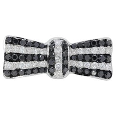 Ravissante bague en forme de ruban de 1 carat et 9 points, de couleur naturelle claire et diamant