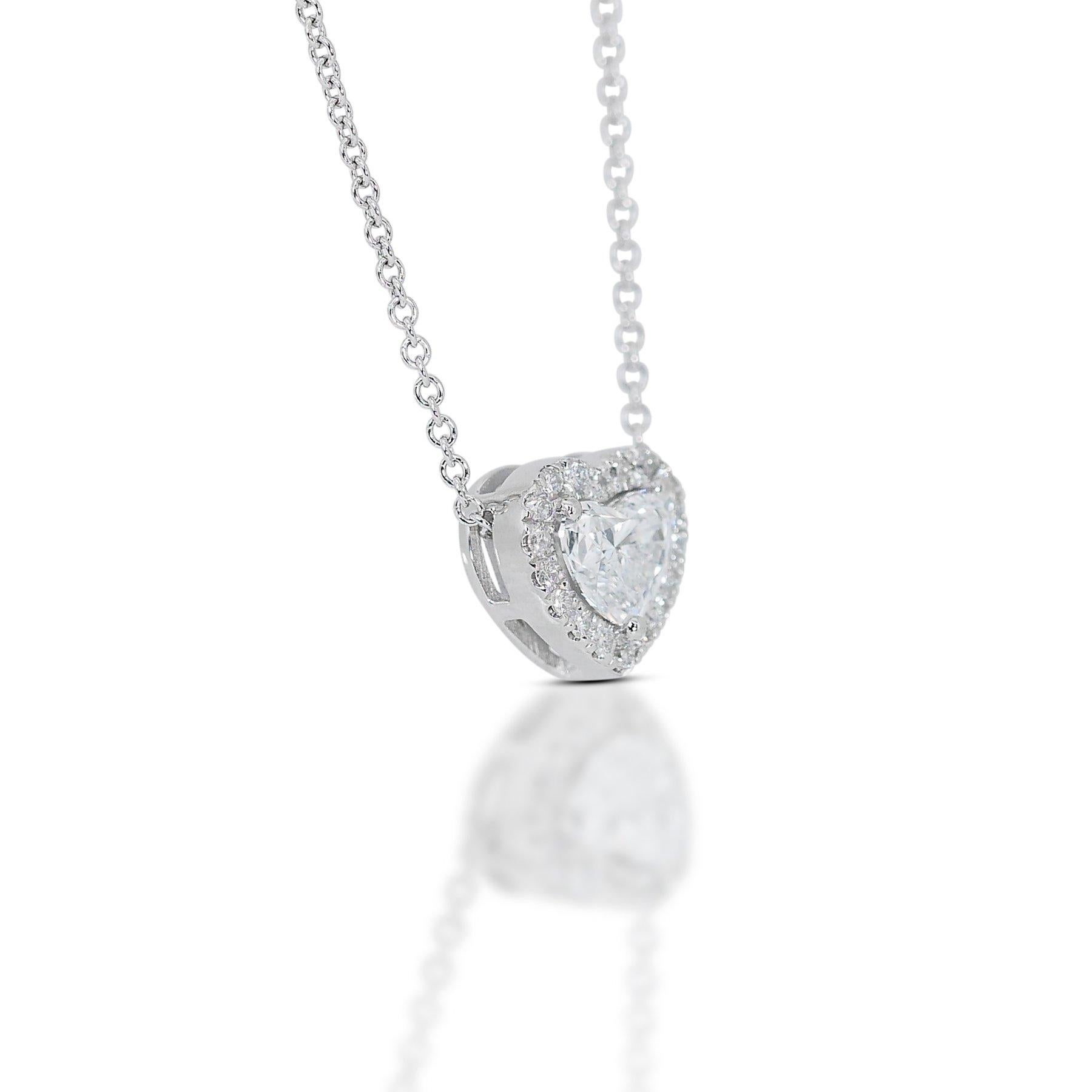 Lovely 1,22ct Diamanten Heart-Shaped Halo Halskette in 18k Weißgold - GIA zertifiziert

Mit dieser exquisiten Diamant-Halskette strahlen Sie mit Raffinesse und Charme. Das aus luxuriösem 18-karätigem Weißgold gefertigte Herzstück ist mit einem