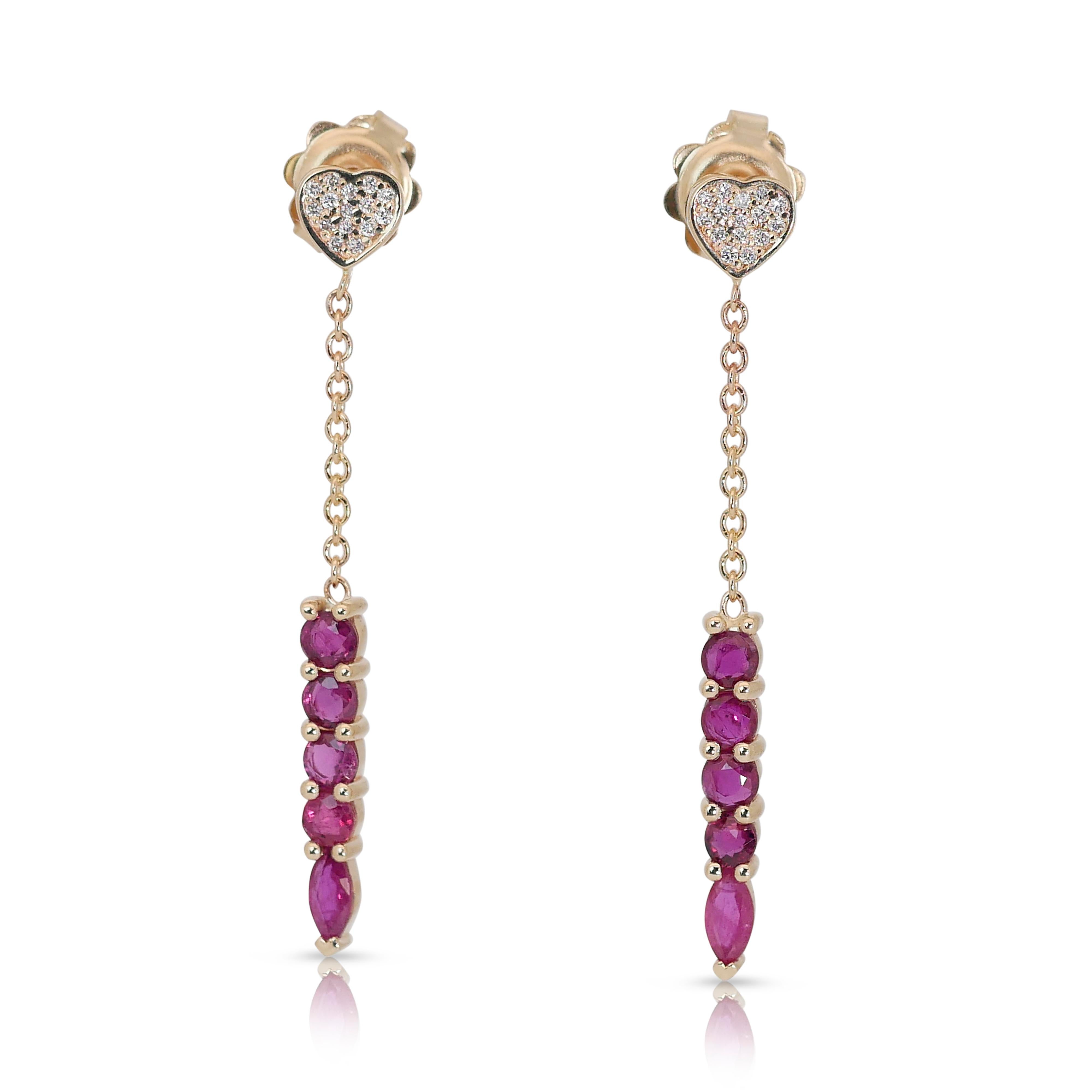Lovely 14k Yellow Gold Ruby and Diamond Drop Earrings w/1.15 ct - IGI Certified

These earrings feature a harmonious arrangement of 8 round rubies, totaling 0.80 ct, their hues transitioning from purple red to purplish red. Adding to the allure, 30