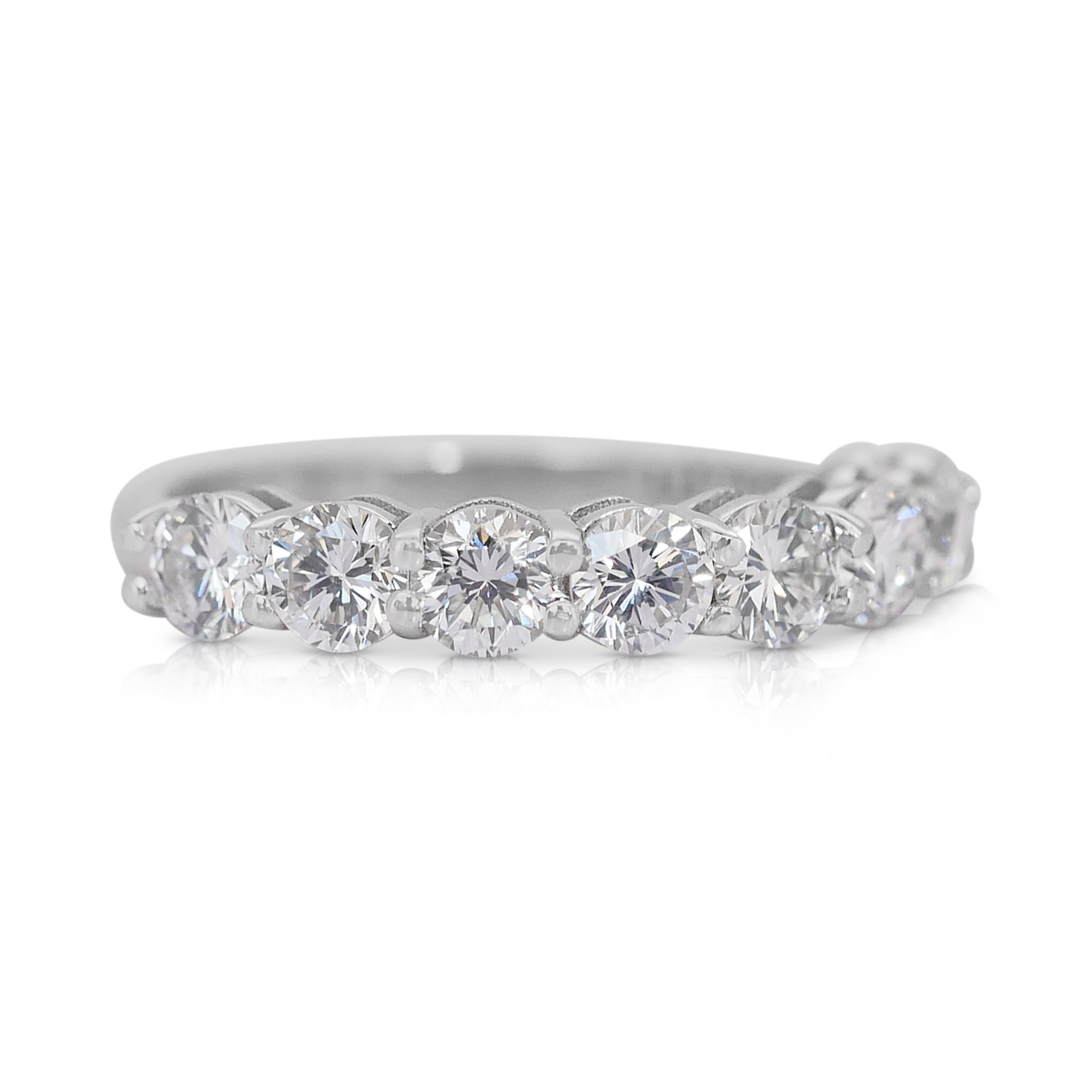 This elegant 18k white gold half-eternity ring is adorned with 8 exquisite round diamonds, totaling 1.78-carat. These diamonds exhibit exceptional brilliance and near-flawless clarity, with a very good cut that maximizes their sparkle. IGI