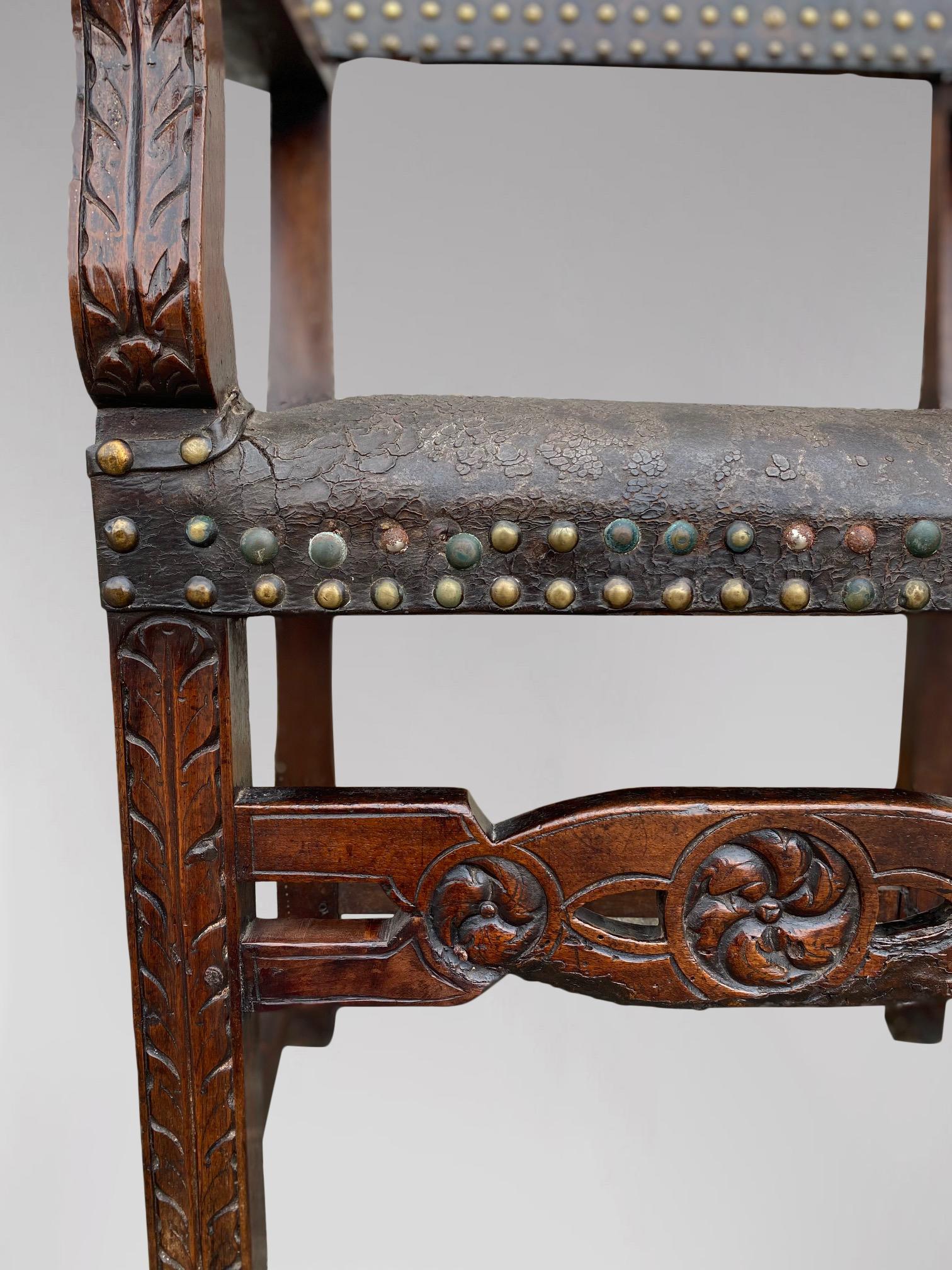 Hand-Carved Lovely 17th Century Spanish Walnut and Leather Armchair For Sale