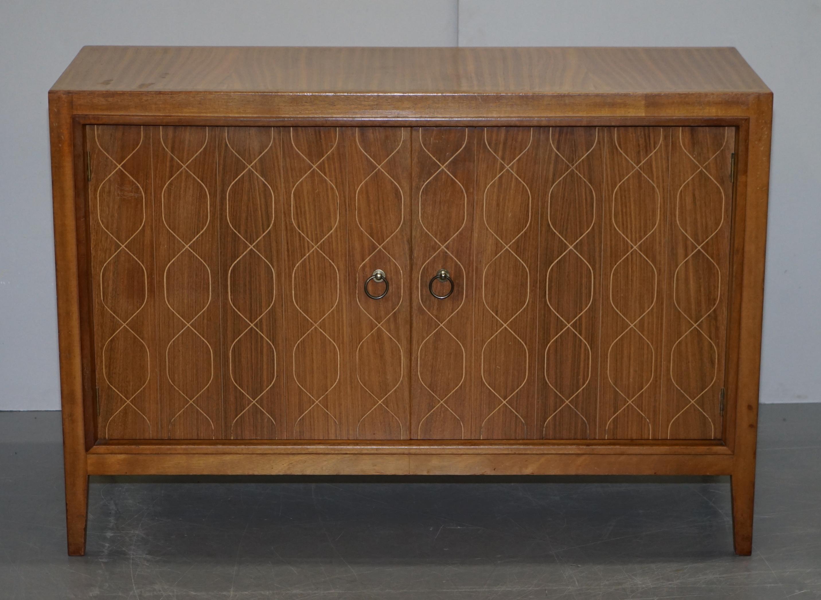 We are delighted to offer for sale this lovely 1951 Exhibited Gordon Russel double helix sideboard 

This wonderful Gordon Russell of Broadway double helix sideboard, model number 407, was designed by David Booth and Judith Ledeboer for the