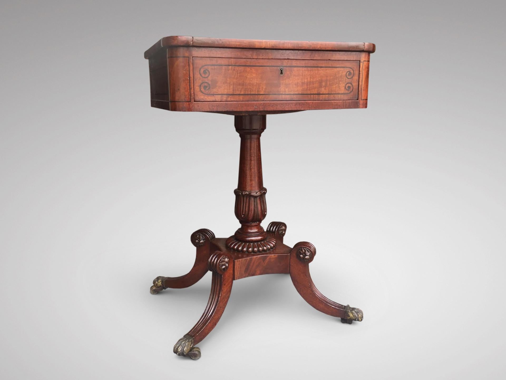 A 19th century mahogany chess table with sliding top above a drawer which features compartments raised on a column with quad form base, four splayed feet ending on brass castors. Georgian period.

The dimensions are:
Height: 71cm (28.0in)
Width: