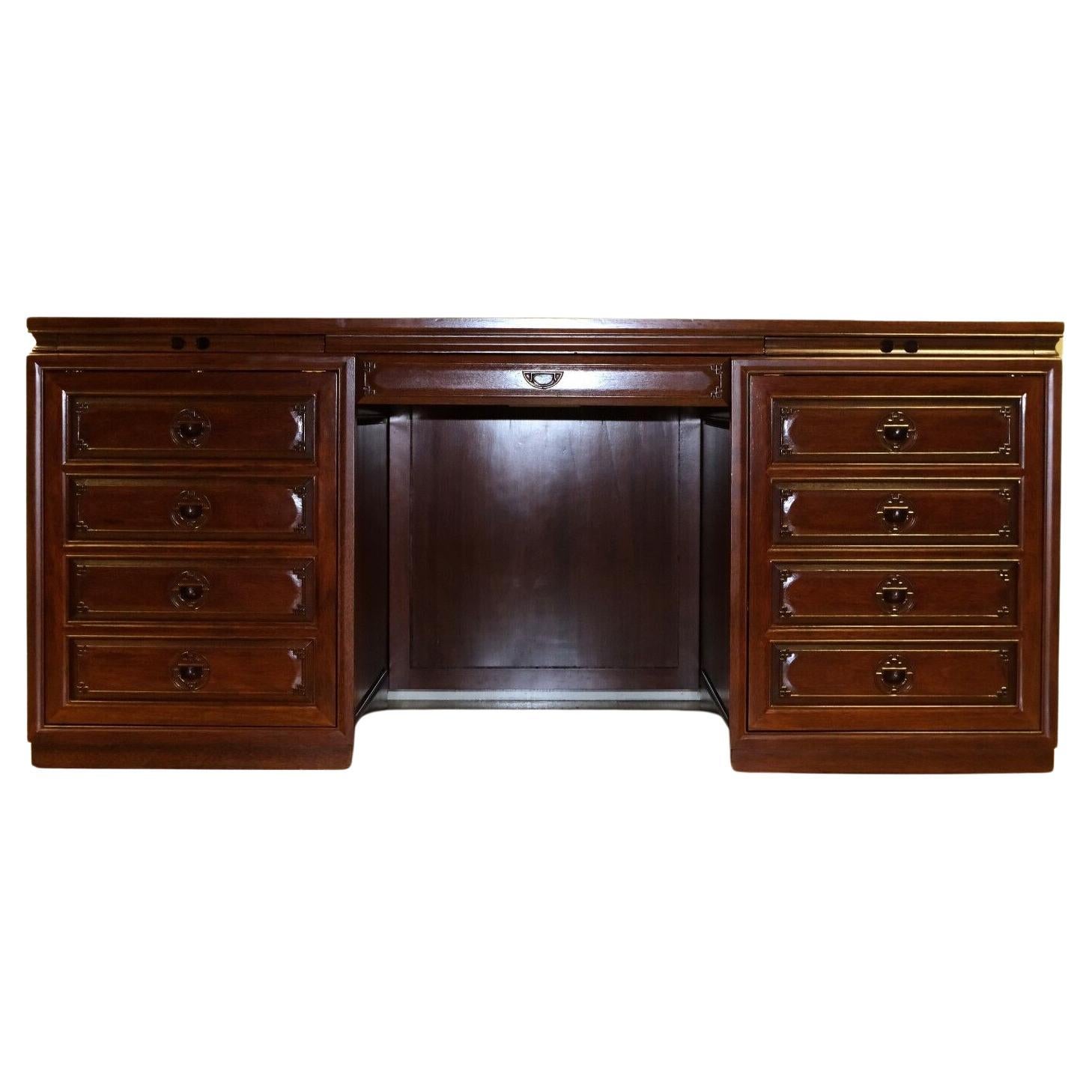We are delighted to offer for sale this lovely 20th Century Chinese Hardwood pedestal desk with small drawers and sliding shelves.

To start, this piece is presented under the top of a central drawer and a pair of brushing slides which are divided