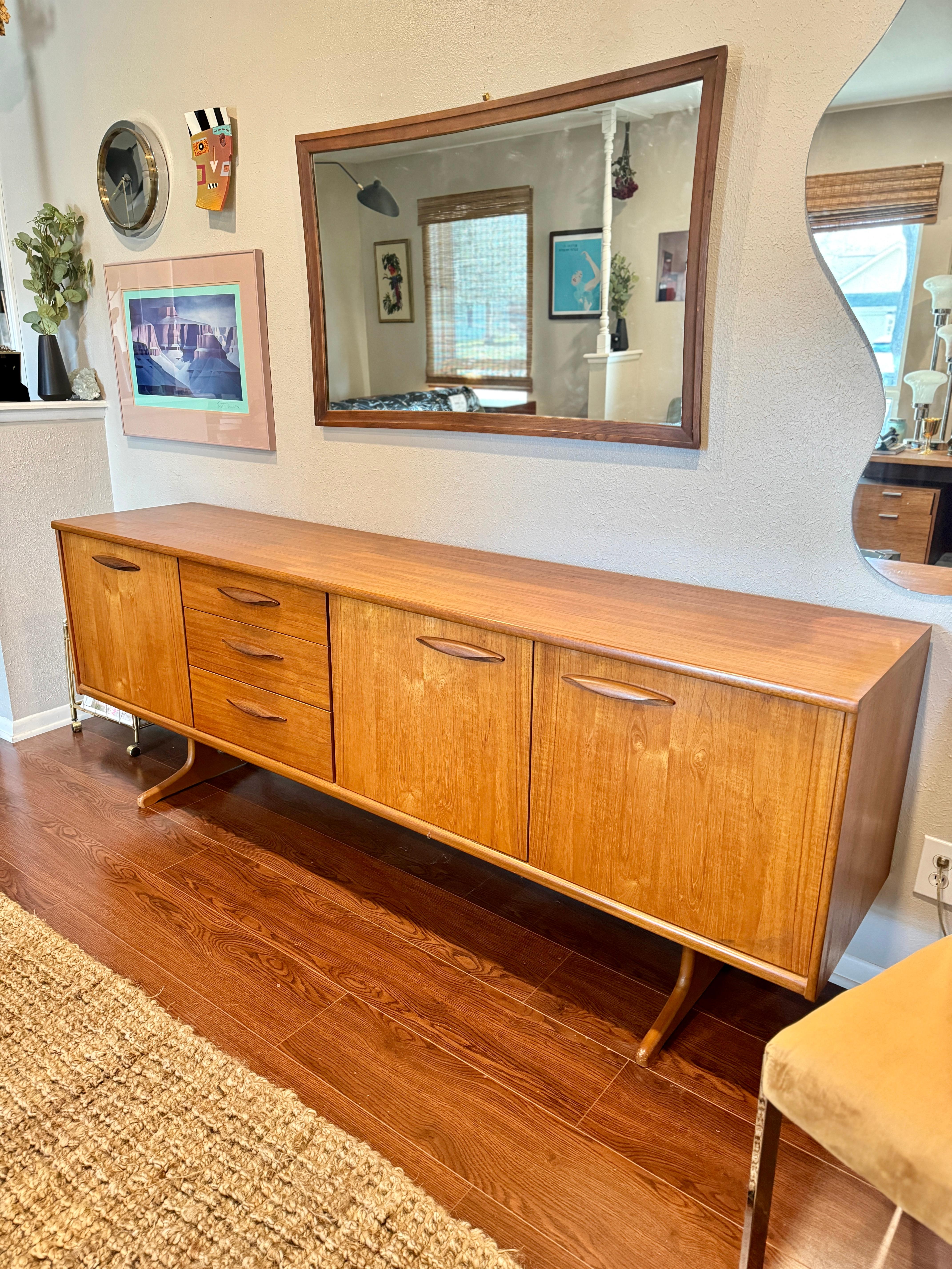 Mid-Century Modern Lovely 84” sideboard designed by Frank Guille and manufactured by Austinsuite