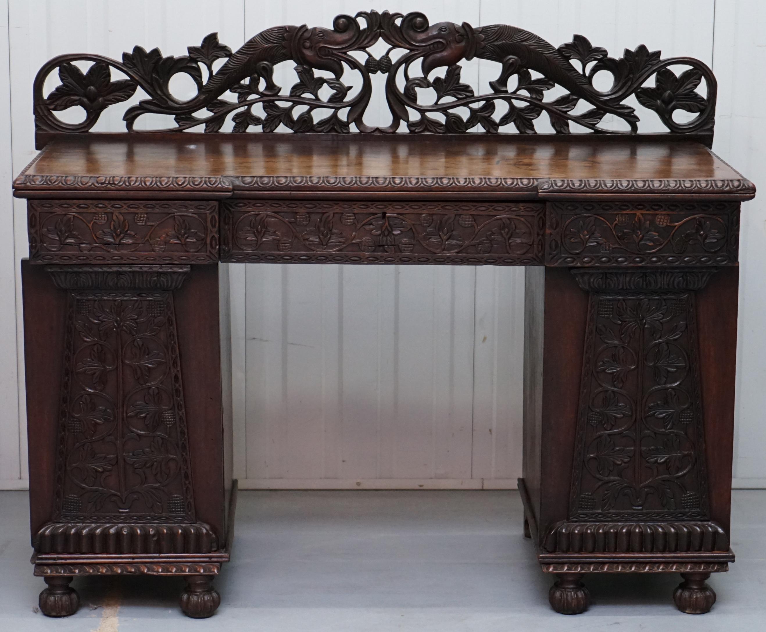 We are delighted to offer for sale this stunning 19th century Anglo Burmese hand carved sideboard with drawers and cupboards

A highly decorative and well made piece, it's complete and original, the timber has a lovely aged patina which really