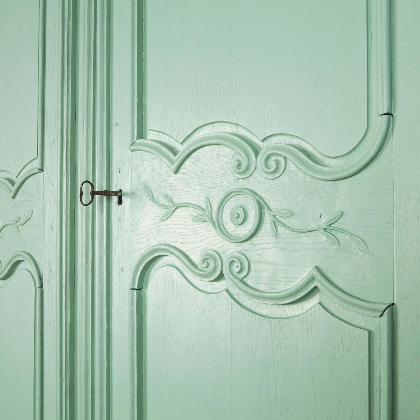 Elegant Soft Green Painted French Marriage Armoire from the 19th Century.

The 