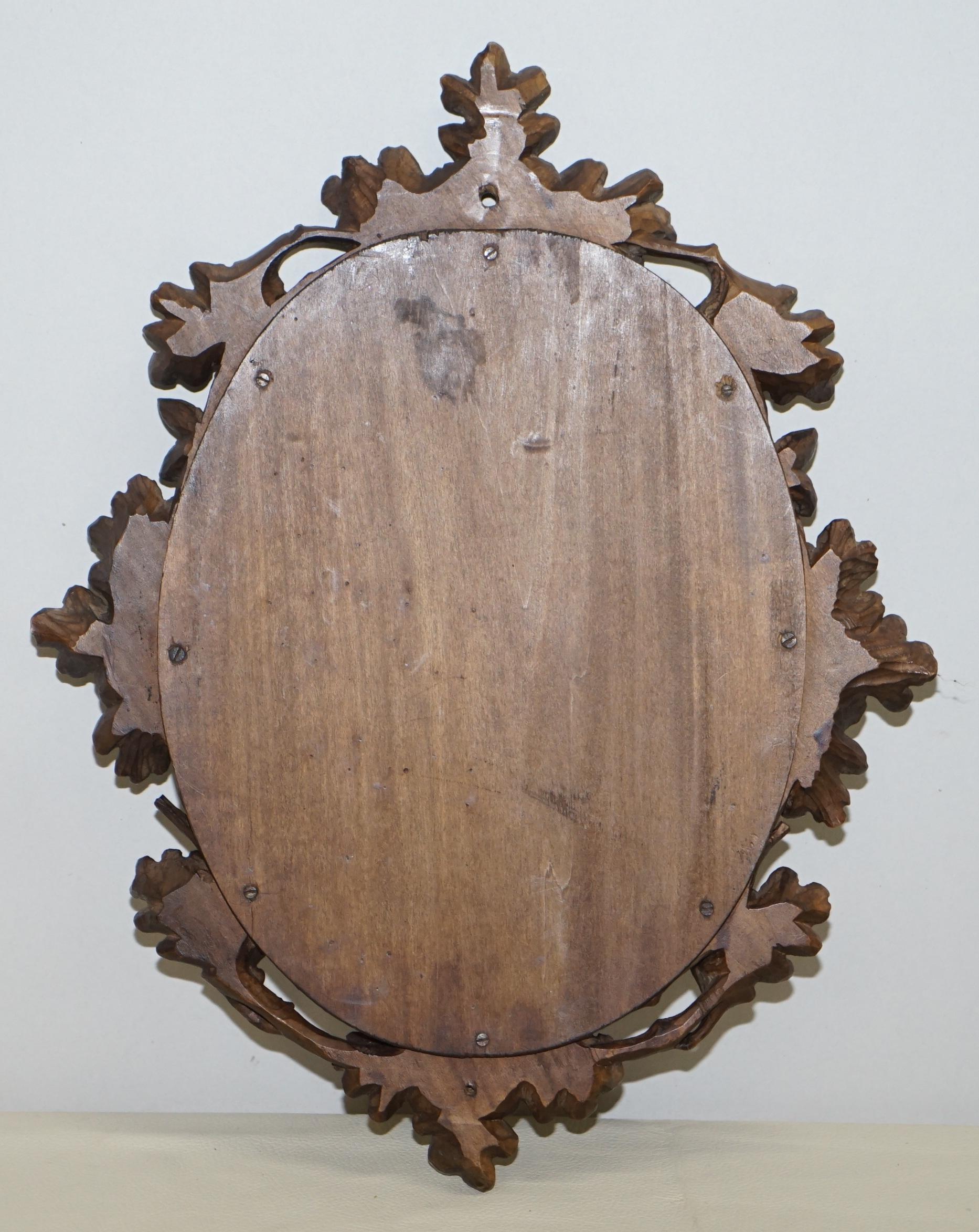 Early 20th Century Lovely Antique Black Forest Hand Carved Wood Wall Mirror Ornately Carved Frame