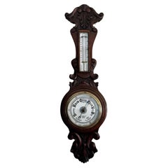 Lovely antique Edwardian carved oak aneroid barometer 