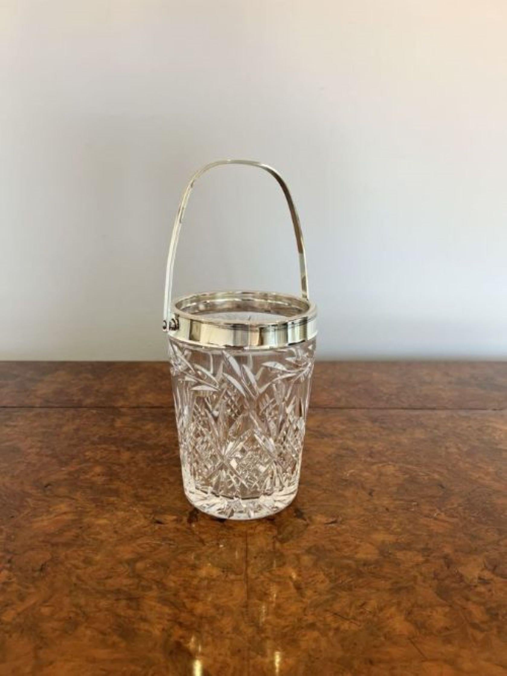 Lovely antique Edwardian quality cut glass ice bucket having a lovely quality antique Edwardian cut glass ice bucket with a swing handle to the top 