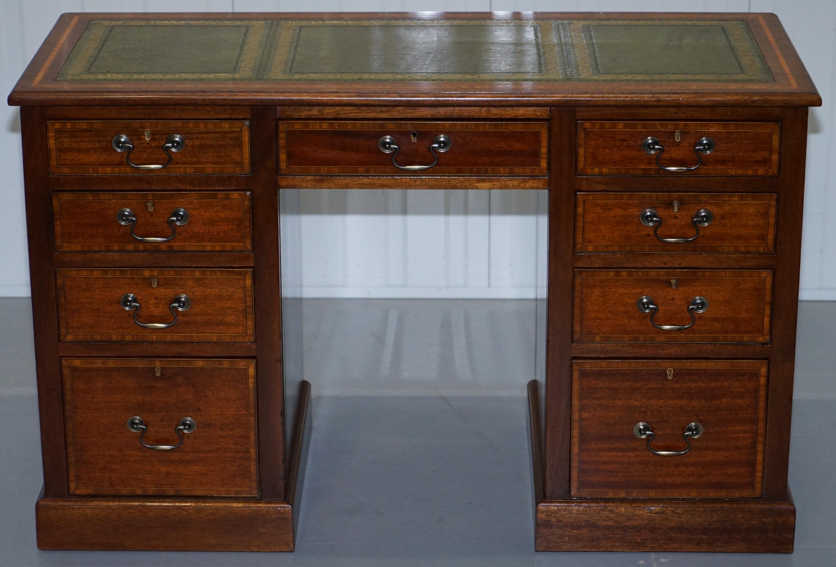 We are delighted to offer for sale this lovely antique mahogany with walnut inlay and green Leather gold embossed writing surface pedestal partners desk

A good looking and a well made decorative piece of furniture, there are many levels in these