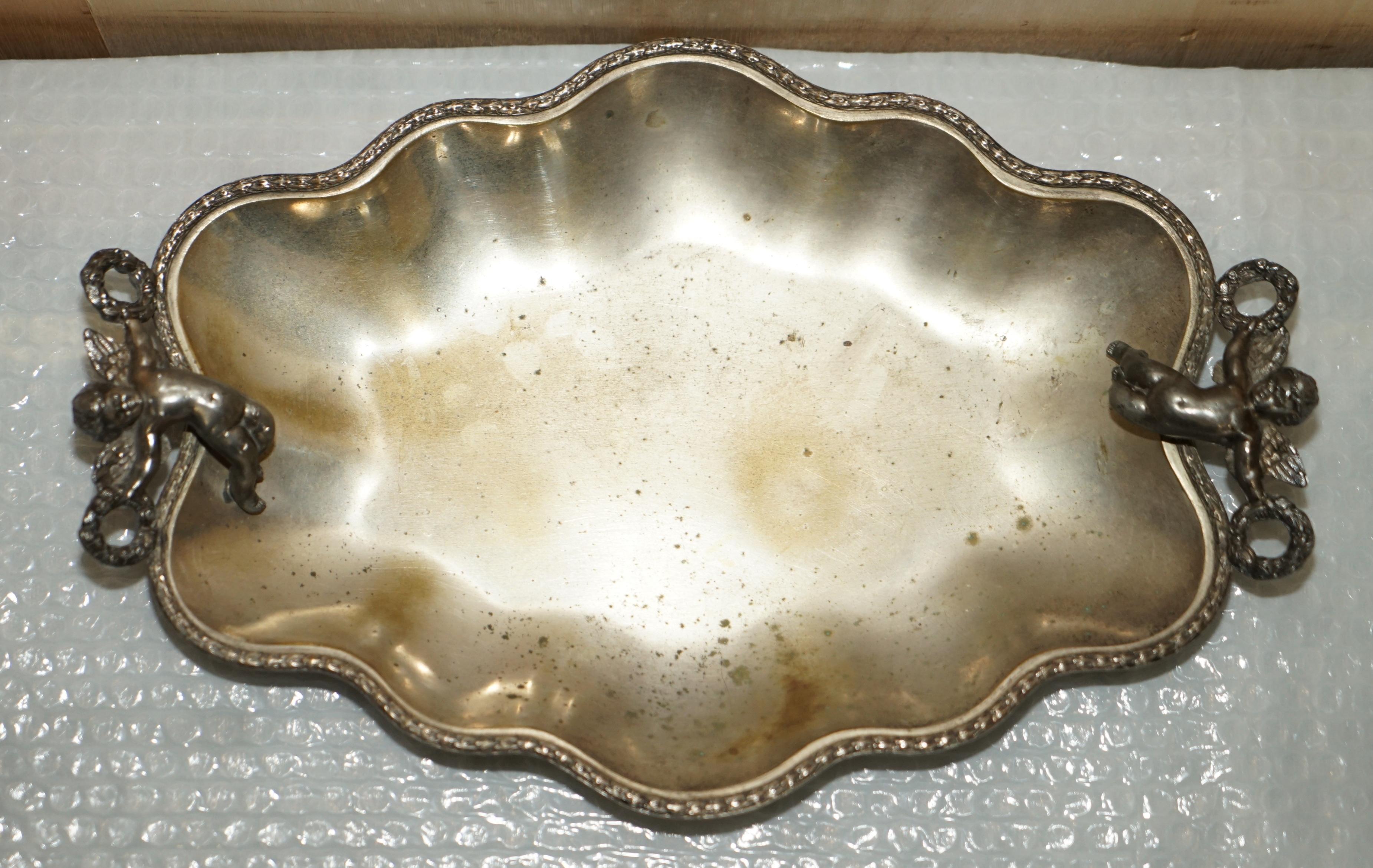 19th Century Lovely Antique Original Worn Finish Silver Plated Cherub Handle Serving Tray For Sale