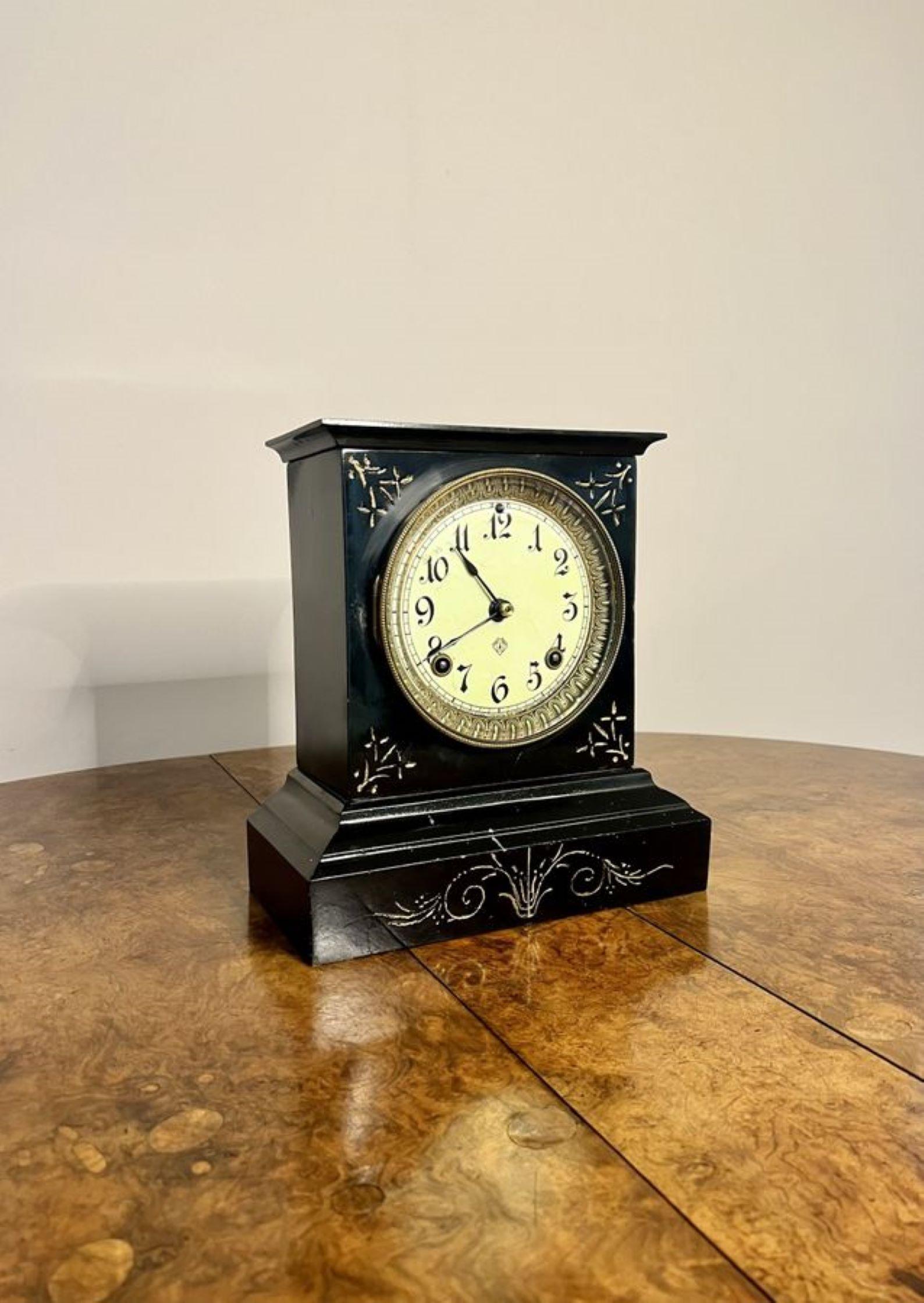 Lovely antique Victorian mantle clock by The Ansonia Clock Company of New York, having a signed white enamel Arabic dial with the original hands surrounded by a ornate brass bezel within a black case with gilt decoration having an eight day
