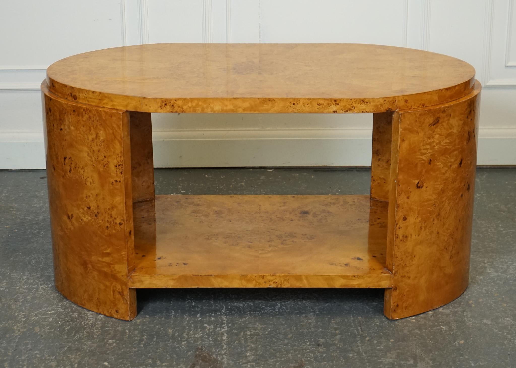 
Antiques of London



We are delighted to offer for sale this Lovely Art Deco Style Oval Burr Walnut Coffee Table.

A lovely Art Deco style oval burr walnut coffee table is an exquisite piece of furniture that exudes elegance and sophistication. It