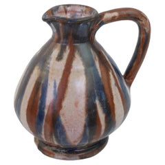 Joli pichet en céramique bleu et marron