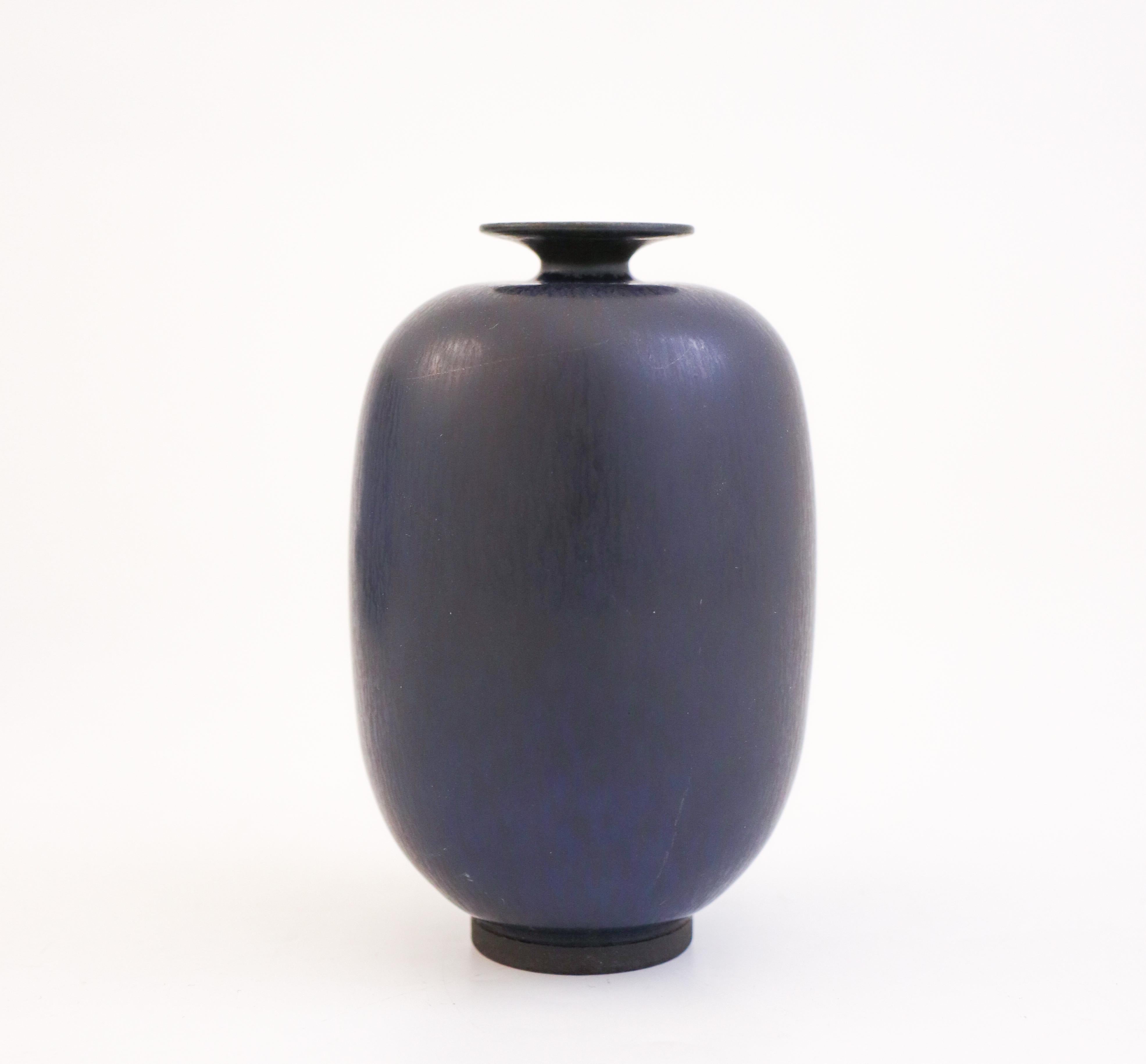 A deep blue vase designed by Berndt Friberg at Gustavsberg in Stockholm, the vase is 10 cm (4